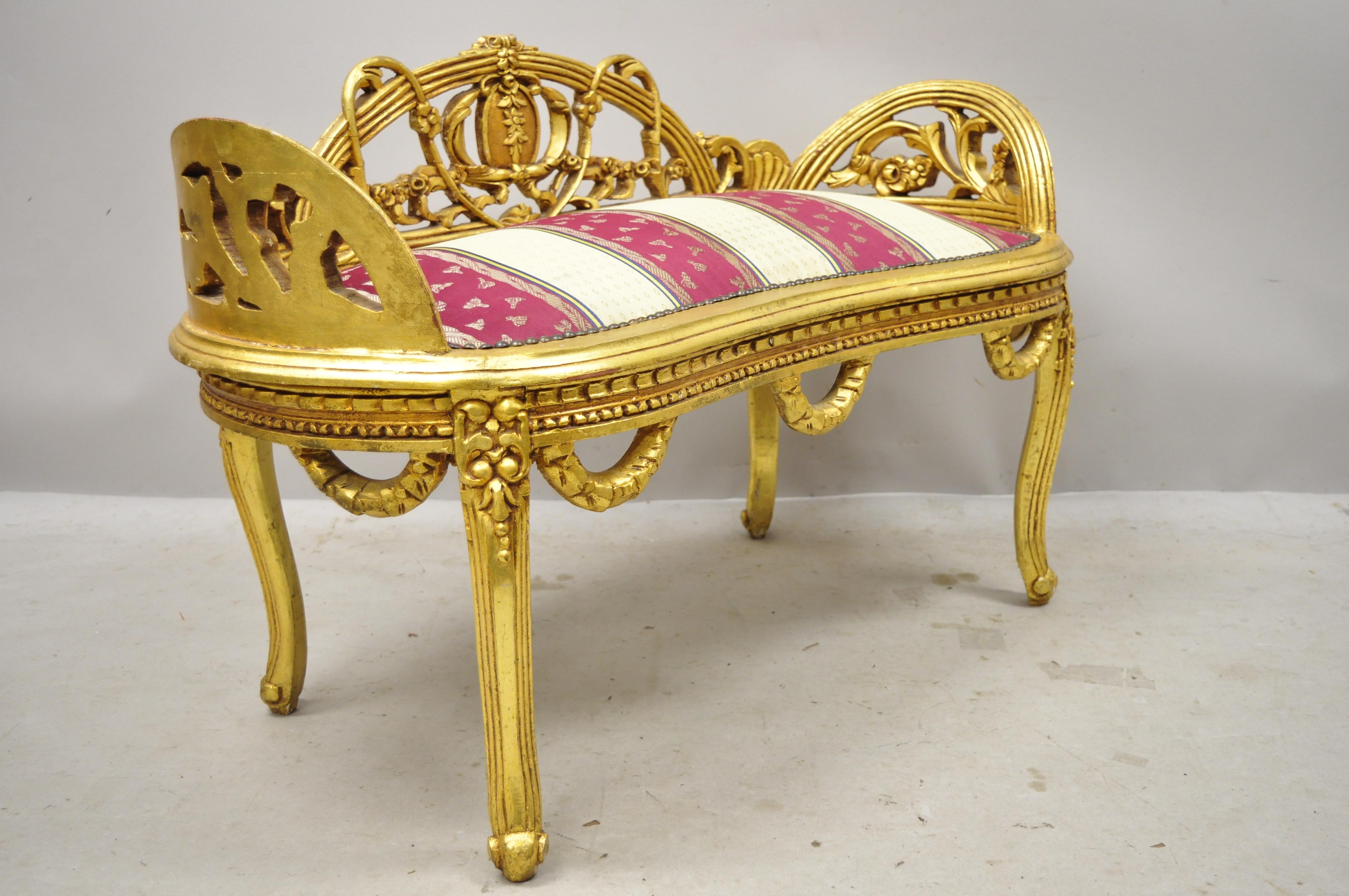 Vintage french Louis XV style gold giltwood kidney shape carved vanity bench. Item features gold gilt finish, ornately carved frame, solid wood frame, nicely carved details, cabriole legs, very nice vintage item, great style and form, circa late