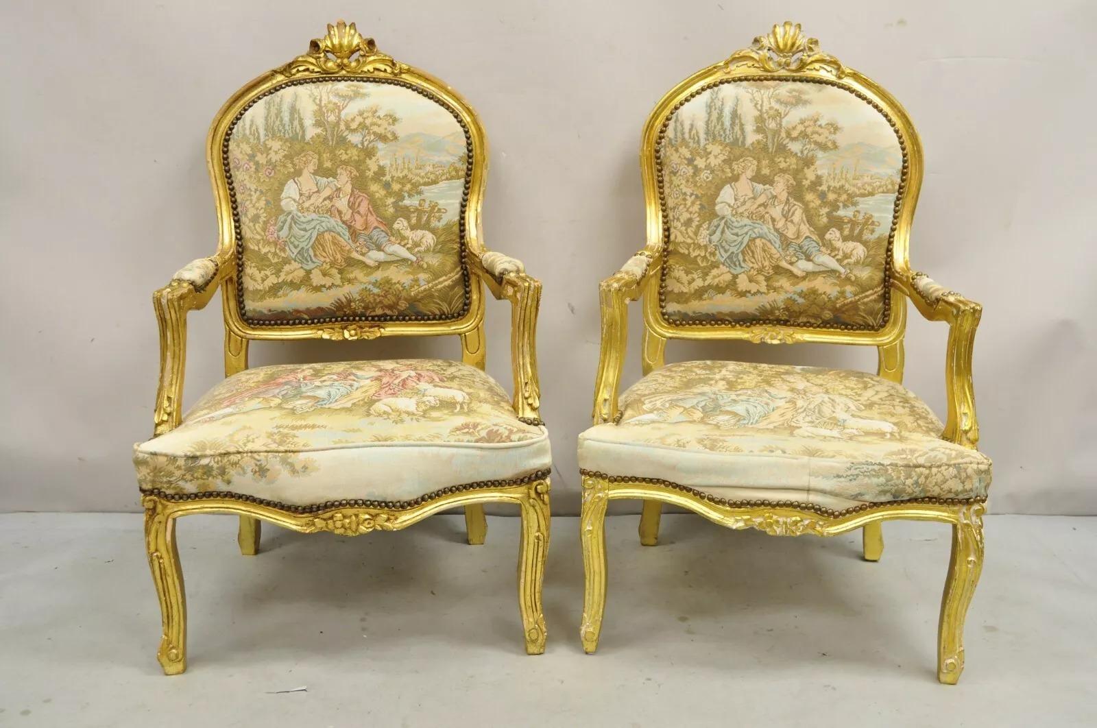 Vintage French Louis XV Style Gold Giltwood Tapestry Fabric Upholstered Arm Chairs - a Pair. Circa Late 20th Century. Measurements: 42.5