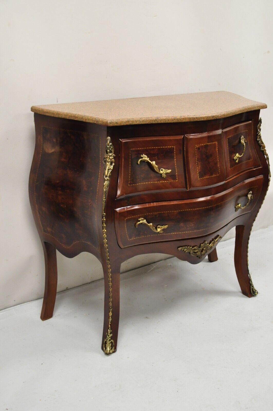 Vintage French Louis XV Style Marble Top Bombe Chest Dresser Commode. Item features 3 drawers, bronze ormolu, pencil inlay, marble top, very nice vintage item. Circa Late 20th Century. Measurements: 36.25