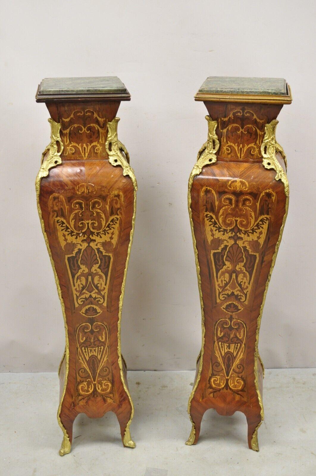 Vintage French Louis XV Style Marble Top Marquetry Inlay Bombe Pedestals - a Pair. Item features Green marble tops, marquetry inlay, brass ormolu, shapely bombe form, very nice vintage pair, great style and form. Circa Late 20th