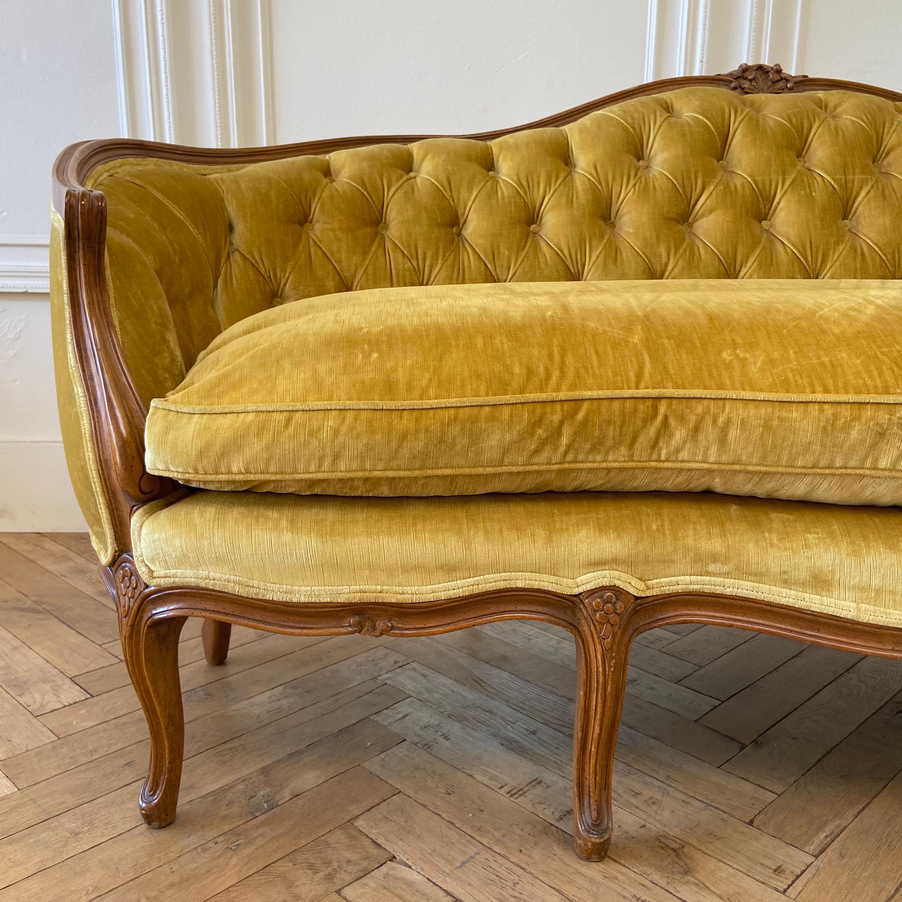 Vintage French Louis XV style sofa with velvet button tufted upholstery
Velvet sofa size: 78”W x 34”D x 35”H
SH: 19”. SD: 21”. AH: 26”
Down wrapped seat cushion
Solid and sturdy ready for everyday use.