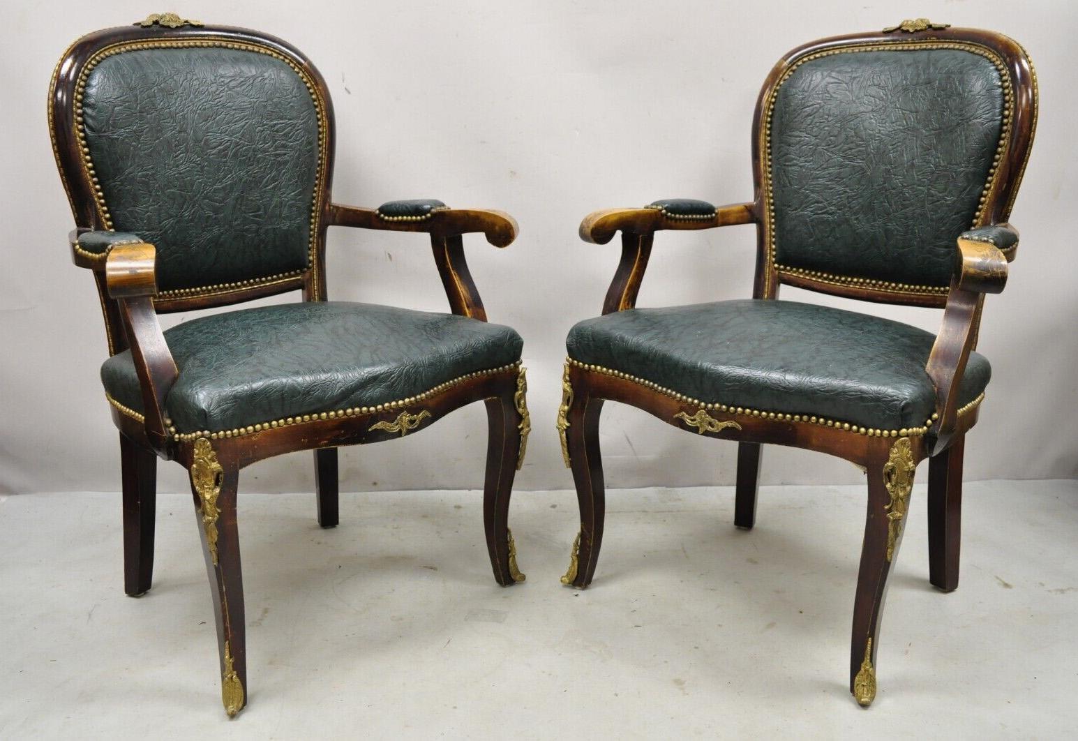 Vintage French Louis XV Style Solid Wood Bronze Ormolu Arm Chairs - a Pair. Item features  green vinyl/Naugahyde upholstery, brass ormolu, solid wood frames, distressed finish, cabriole legs, very nice vintage pair, great style and form. Circa Mid