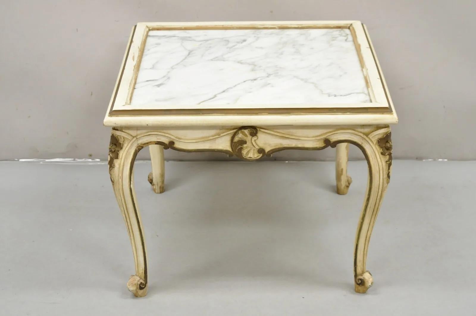 Vintage French Louis XV Style White Painted Marble Top Small Square Coffee Table. Item features white and dark gold paint distressed finish, marble top, shapely legs, very nice low vintage table. Circa Mid 20th Century. Measurements: 19