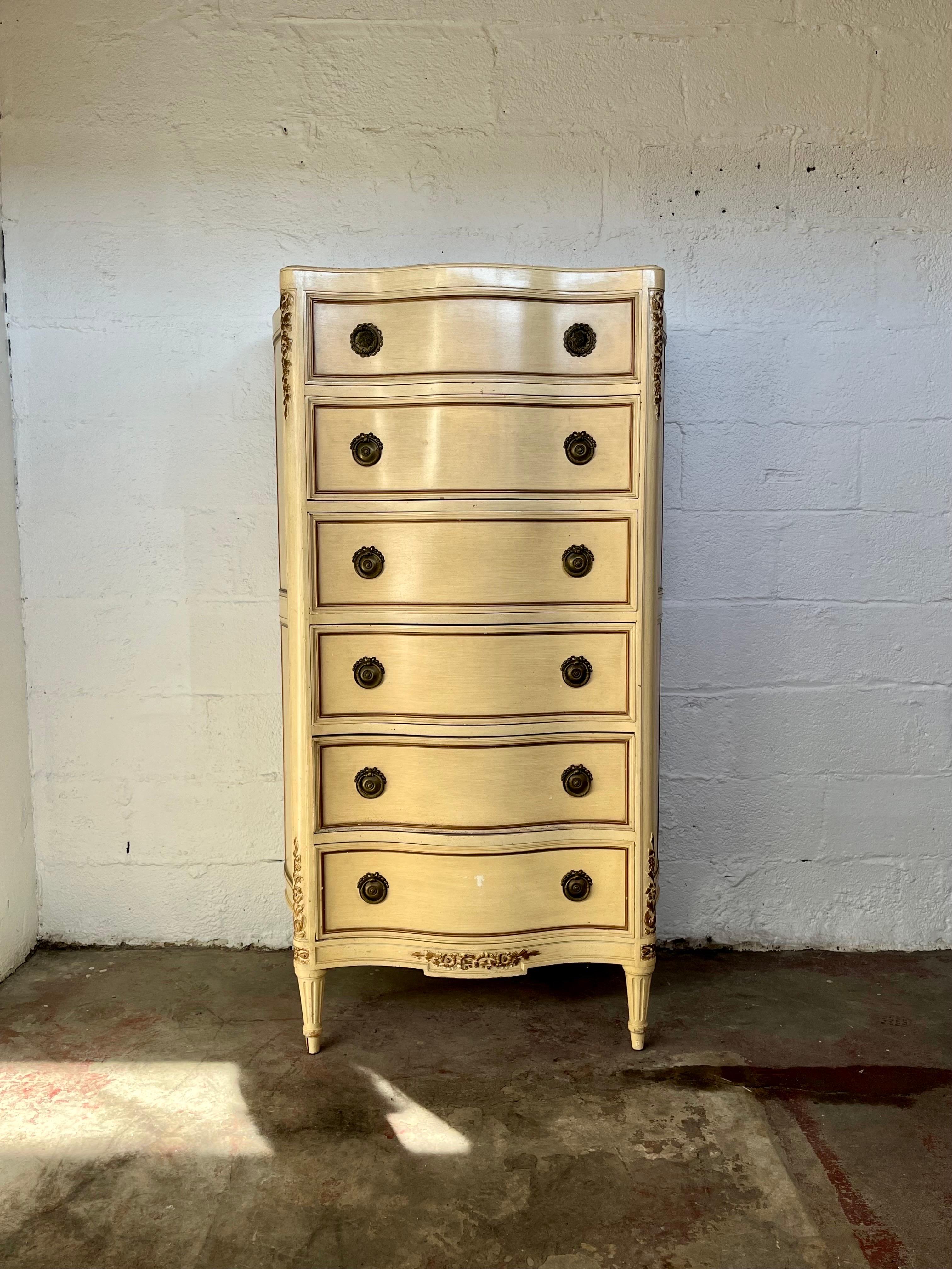 Spectacular chest of drawers in the Louis XVI style. Beautiful lines with demilune profile. Laurel wreath drawer pulls and carved draped floral accents.
Curbside to NYC/Philly $450