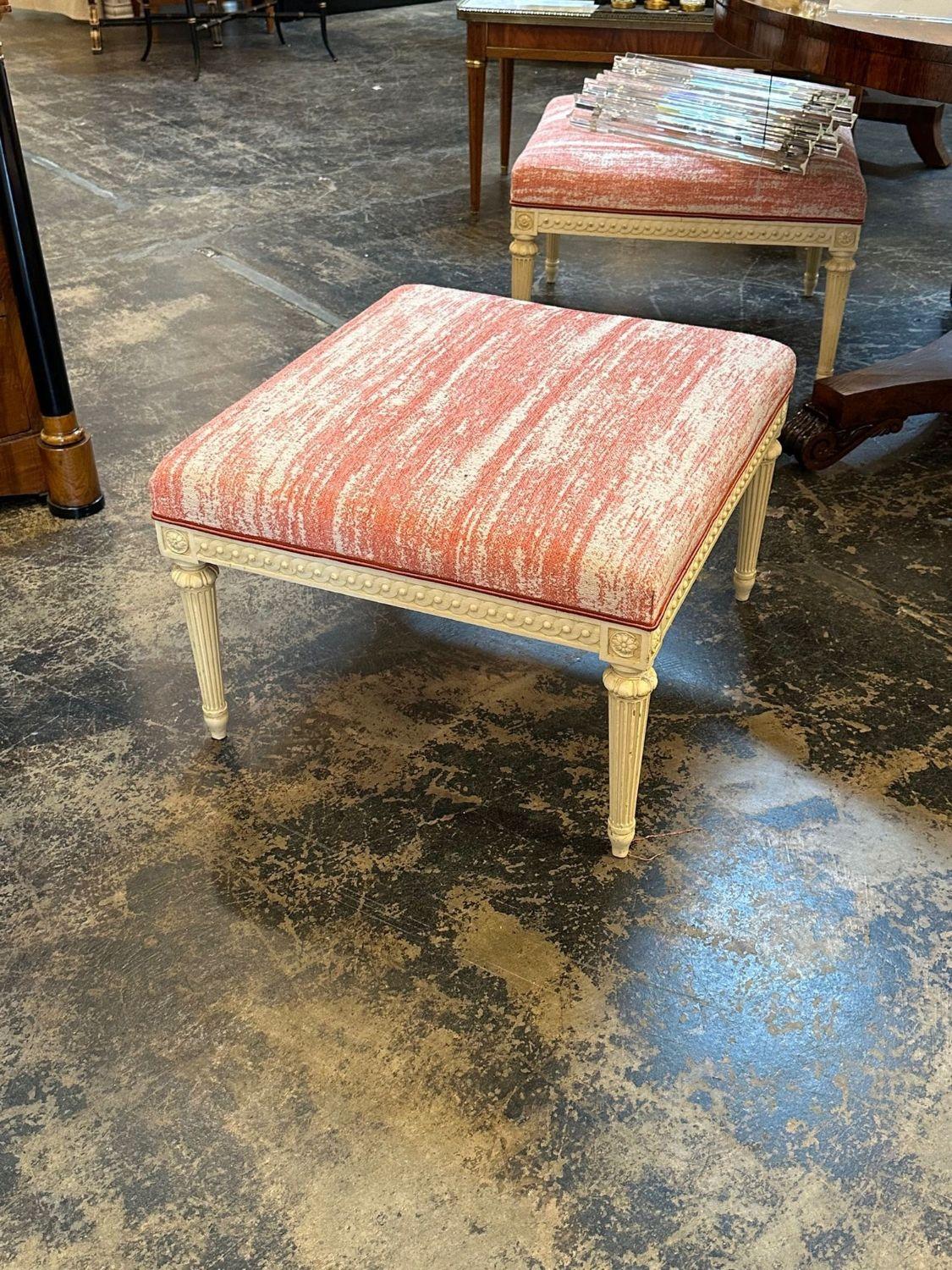 Vintage French Louis XVI style carved and painted ottoman. Circa 1940. Perfect for today's transitional designs!