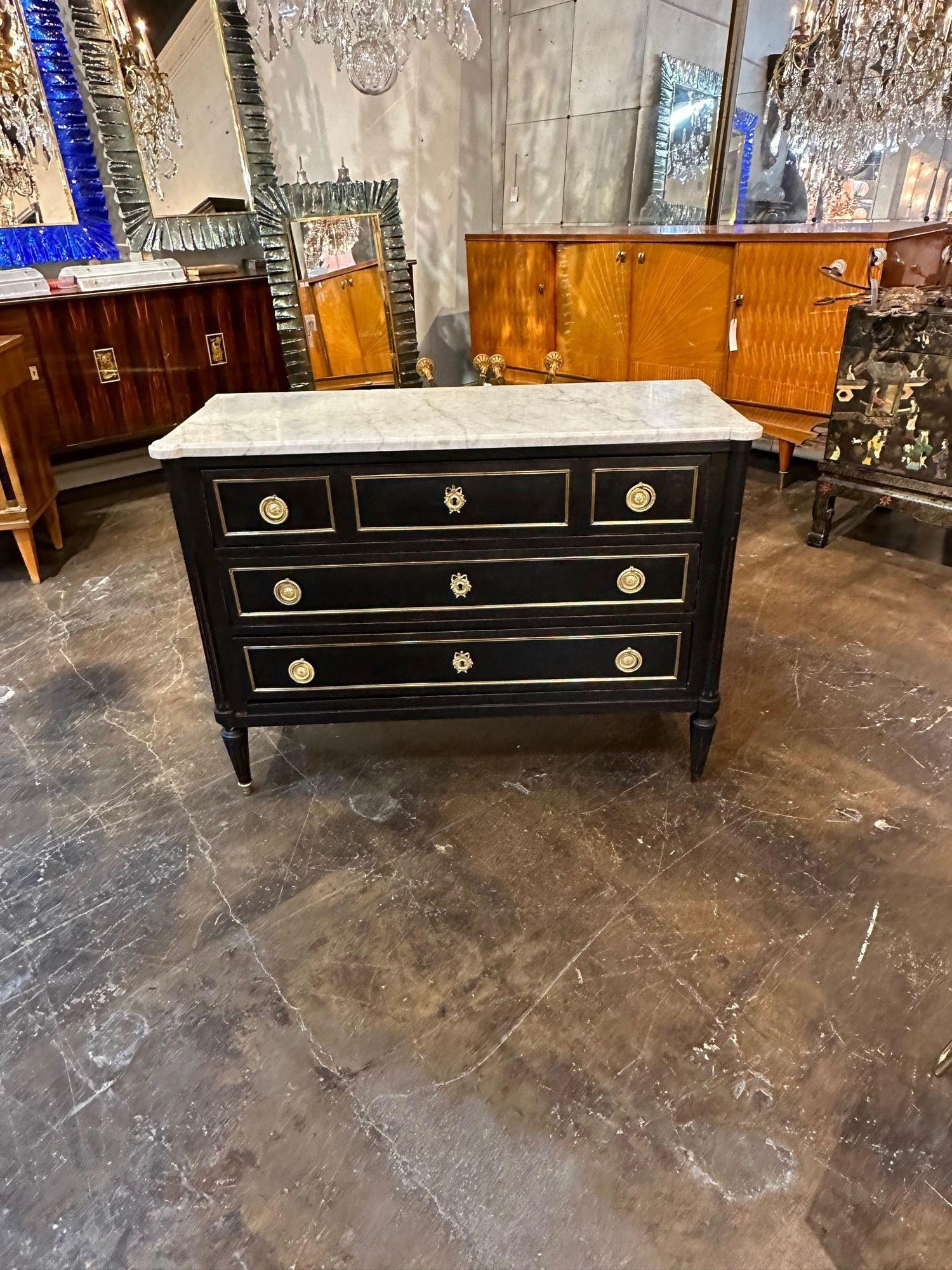 Vintage French Louis XVI style black lacquered and brass chest. Circa 1940.