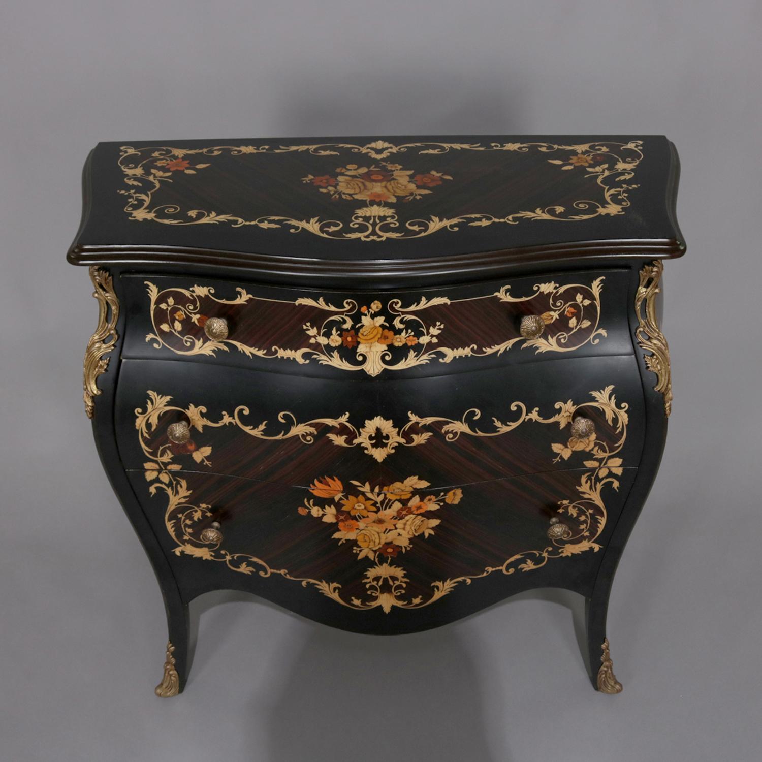 Vintage French Louis XVI style commode features ebonized wood construction in bombe form with three drawers and all-over painted and gilt floral, foliate and scroll design, seated on tapered concave legs with foliate cast ormolu mounts, 20th
