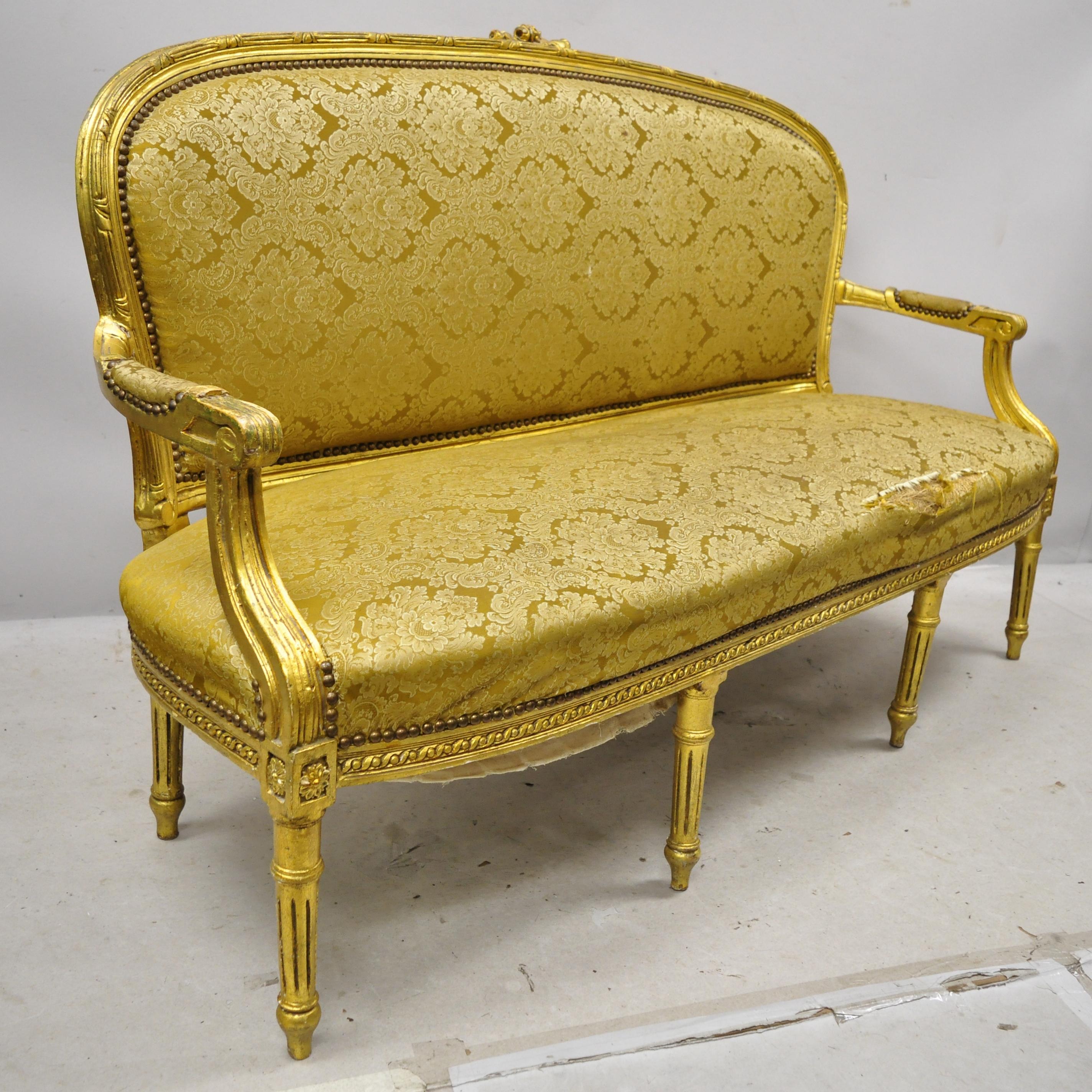 Vintage French Louis XVI style gold leaf 6 leg settee loveseat sofa. Item features distressed gold gilt/gold leaf finish, solid wood frame, nicely carved details, 6 cabriole legs, great style and form, circa mid-late 20th century. Measurements: 38