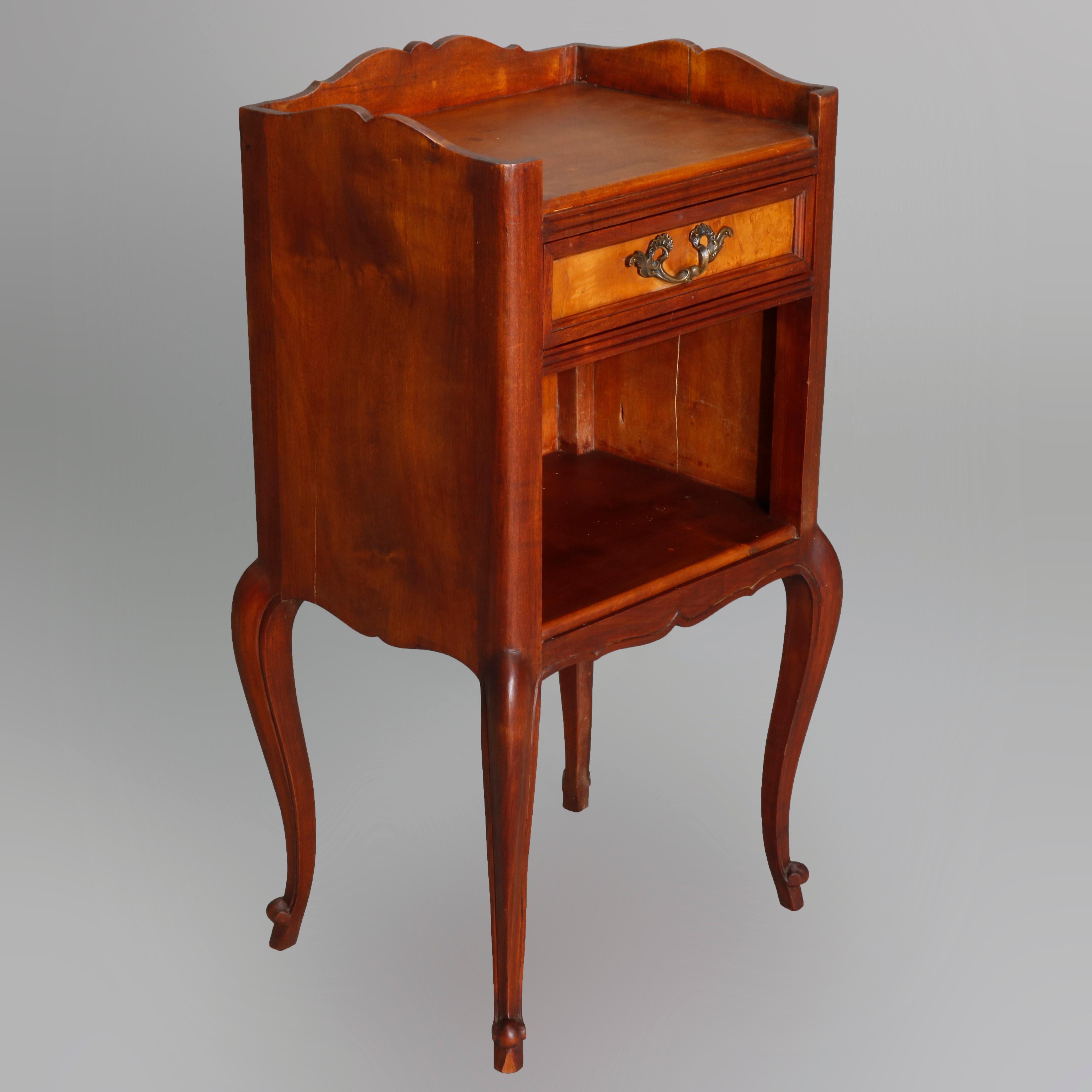 Vintage French maple nightstand with enclosed top over single drawer and lower shelf, raised on cabriole legs with scroll feet, 20th century

Measures- 30.25