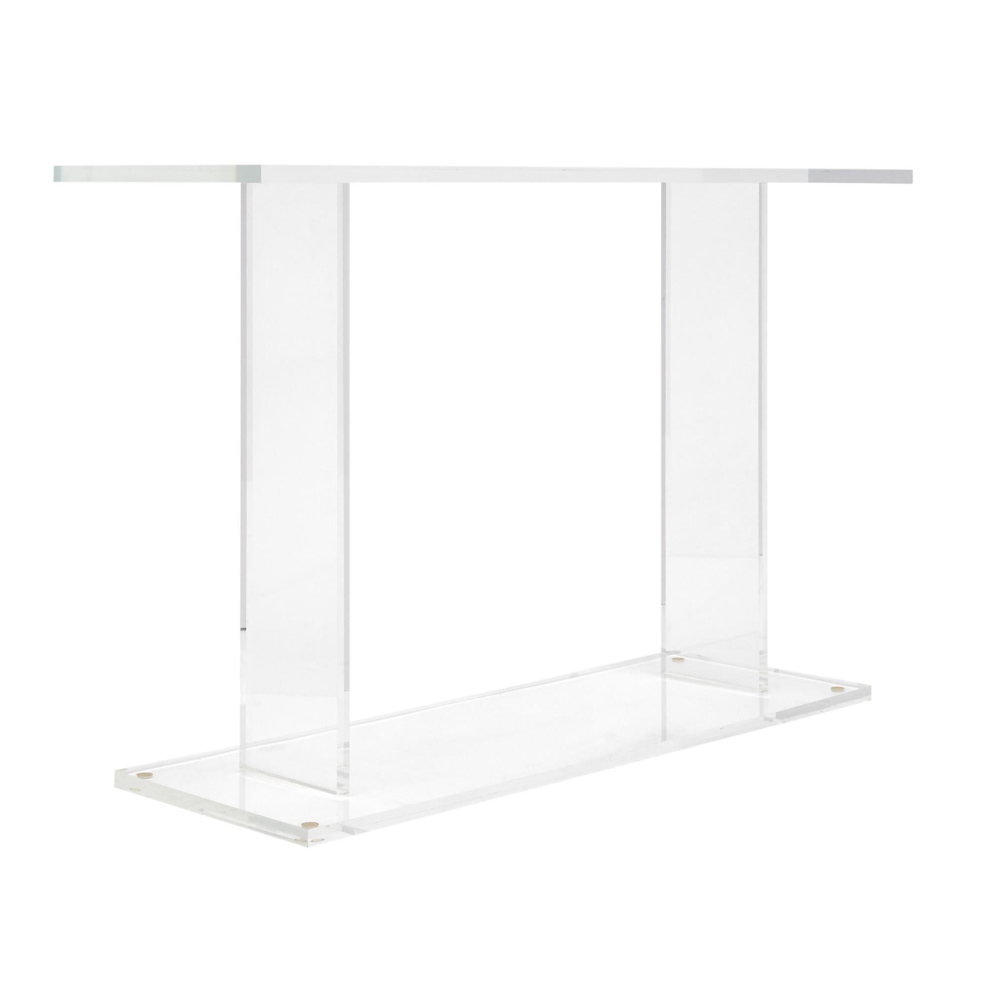 Lucite console table from France. This piece has lovely lines.
