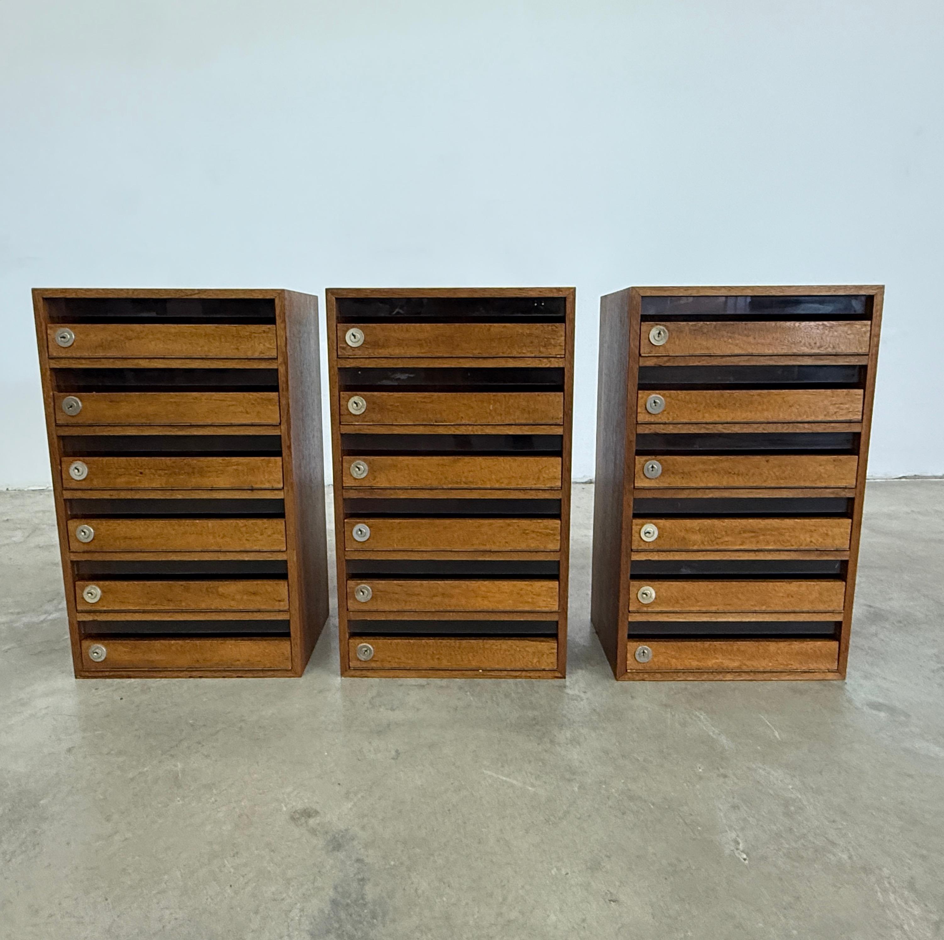 Dimensions: H 23.7” x W 14.3” x D 10.3”

Set of 3 Vintage wooden postboxes, each one with 6 boxes. ROLEX factory, Geneva.

Please see our other listings for ideas and matching pieces.

Condition: Vintage condition, present scratches. Please observe