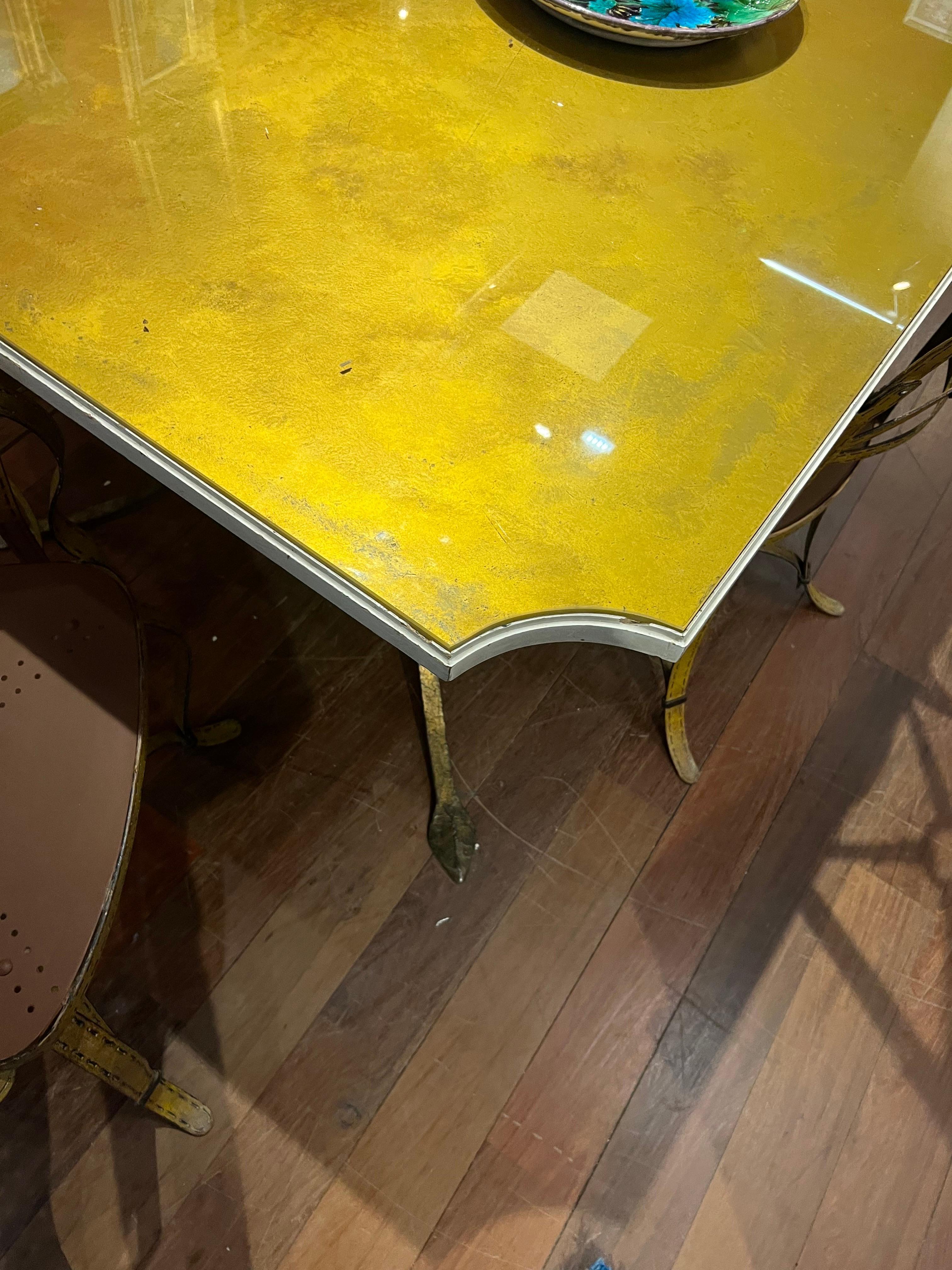 Smoked Glass Vintage French Maison Ramsay Forged Gilded Dining Table with Yellow Glass Top For Sale