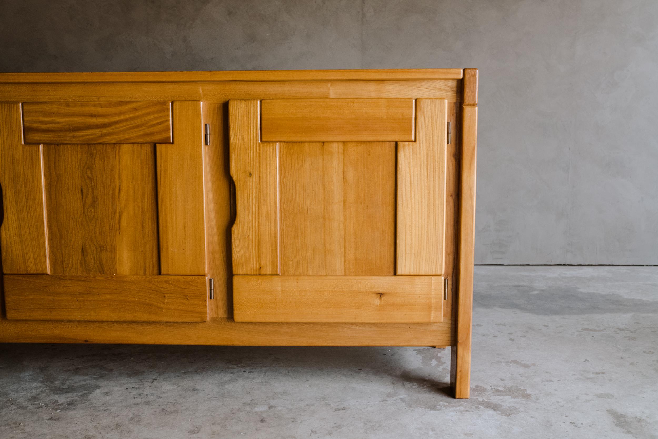 Vintage French Maison Regain sideboard from France, 1960s. Solid elm construction with light patina and wear. Fantastic quality and design.