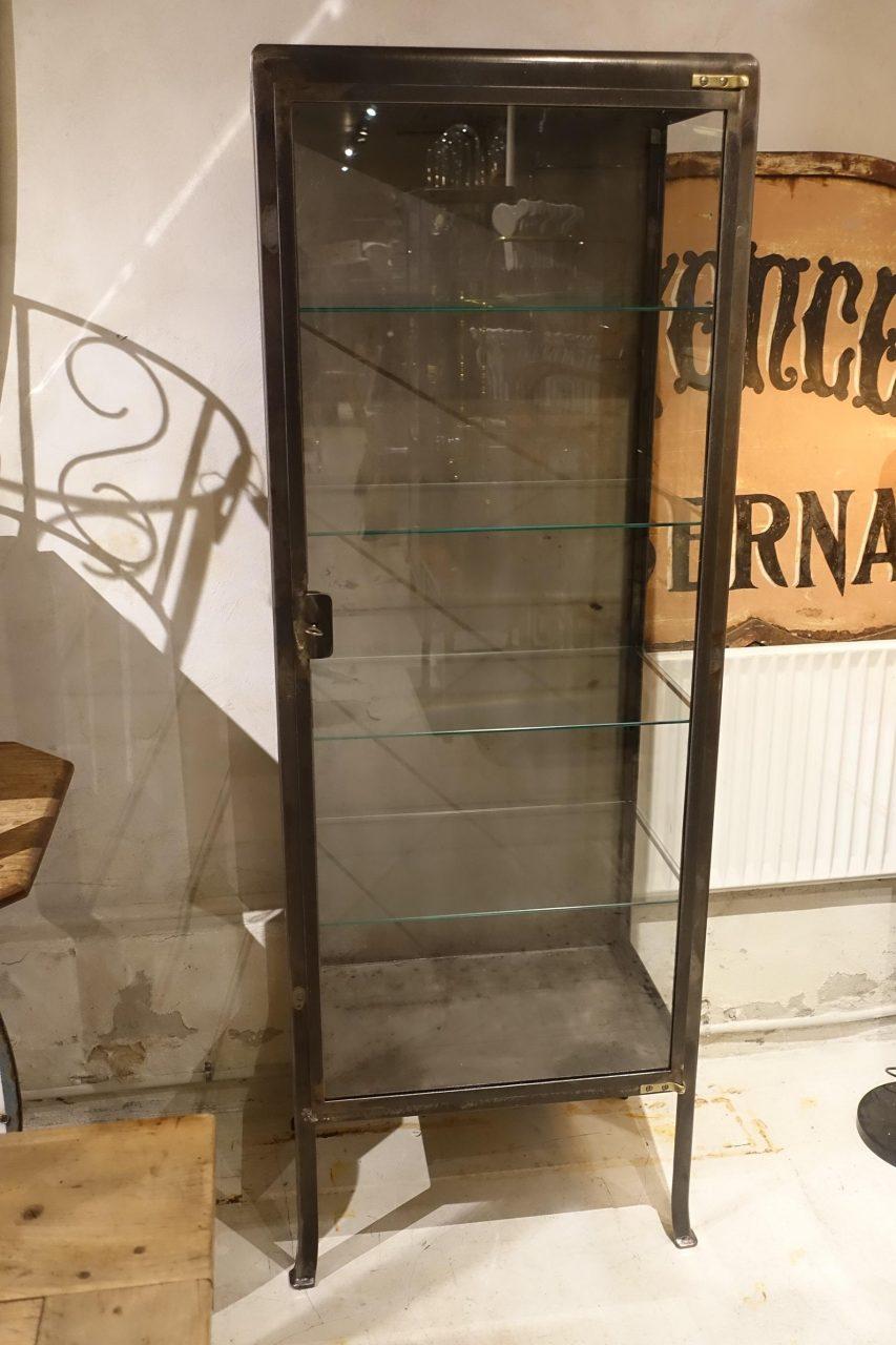 Vintage French medicine cabinet from the 1930s, in stripped, treated and polished metal. This sleek cabinet has gorgeous slim adjustable glass shelves. An ideal cupboard for products and towels in your bathroom.