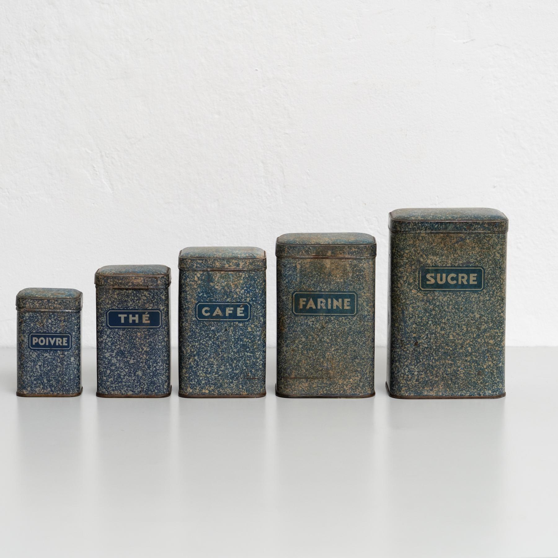 This exquisite set of metal pots, originating from France in the early 20th century, is a true collector’s treasure. Each pot is meticulously designed to store essentials like coffee, pepper, sugar, and other pantry staples. The set showcases the
