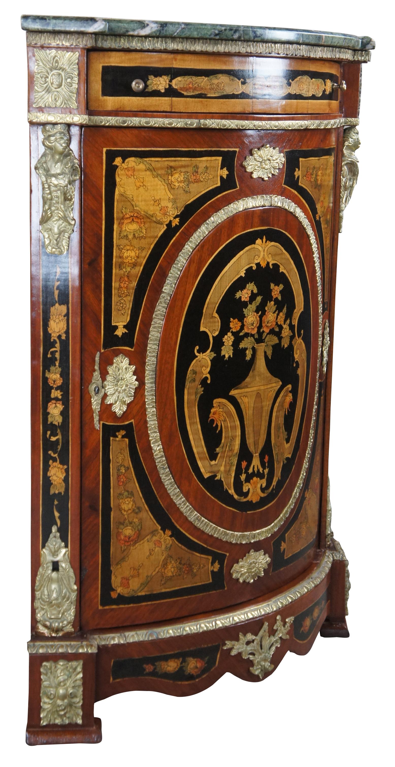 An exquisite French Boulle style corner cupboard in the manner of Napoleon III and Louis XVI, circa second half 20th century. Made from walnut with a green marble top over drawer and lower cabinet. Features painted floral motifs, brass medallions