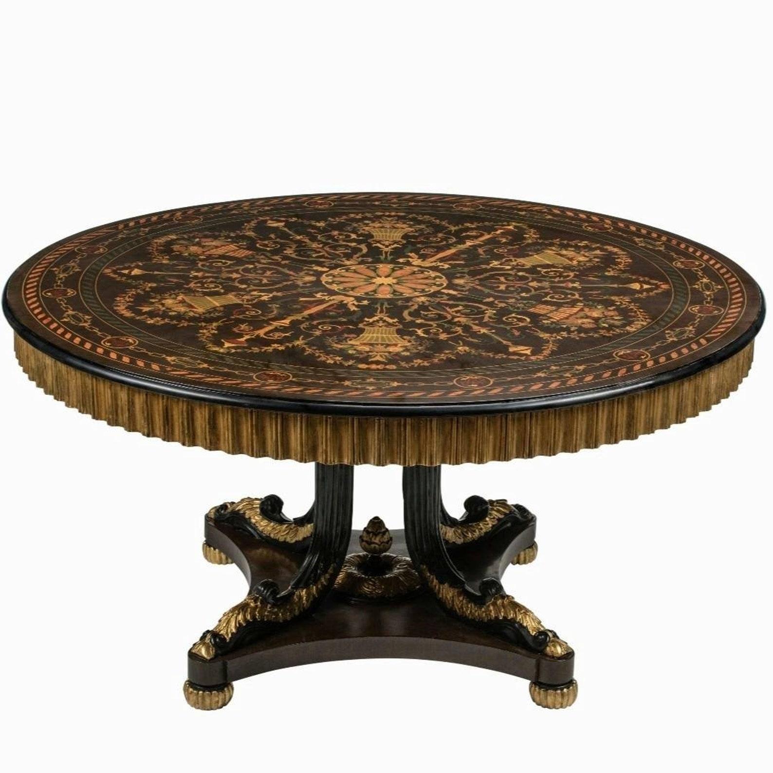 A magnificent antique French Napoleon III Second Empire style carved gilt wood black lacquer accented round dining table or centre table with exquisite marquetry-work.

Most impressive large size, very fine quality craftsmanship and construction,