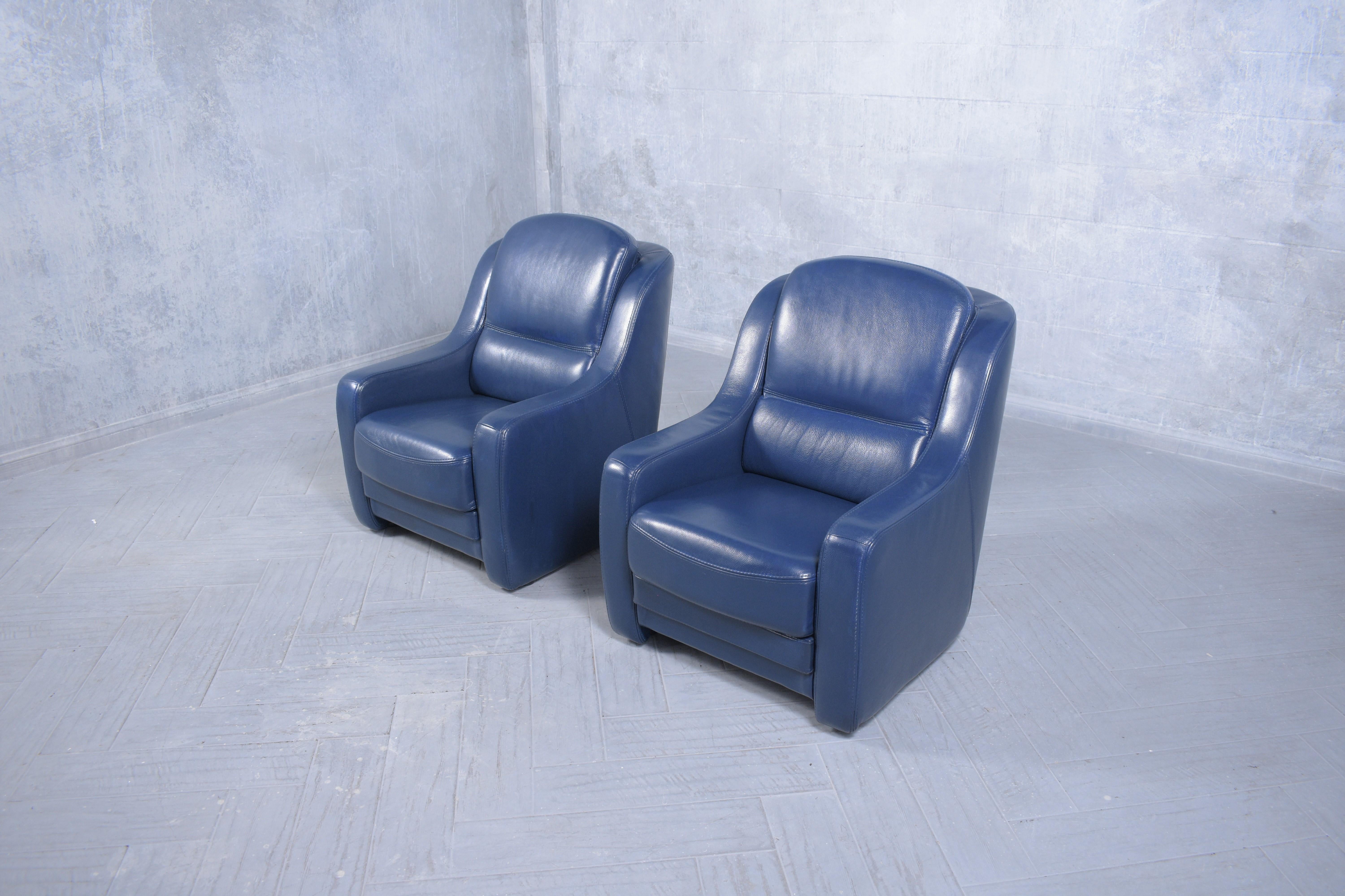 navy blue leather chair and ottoman