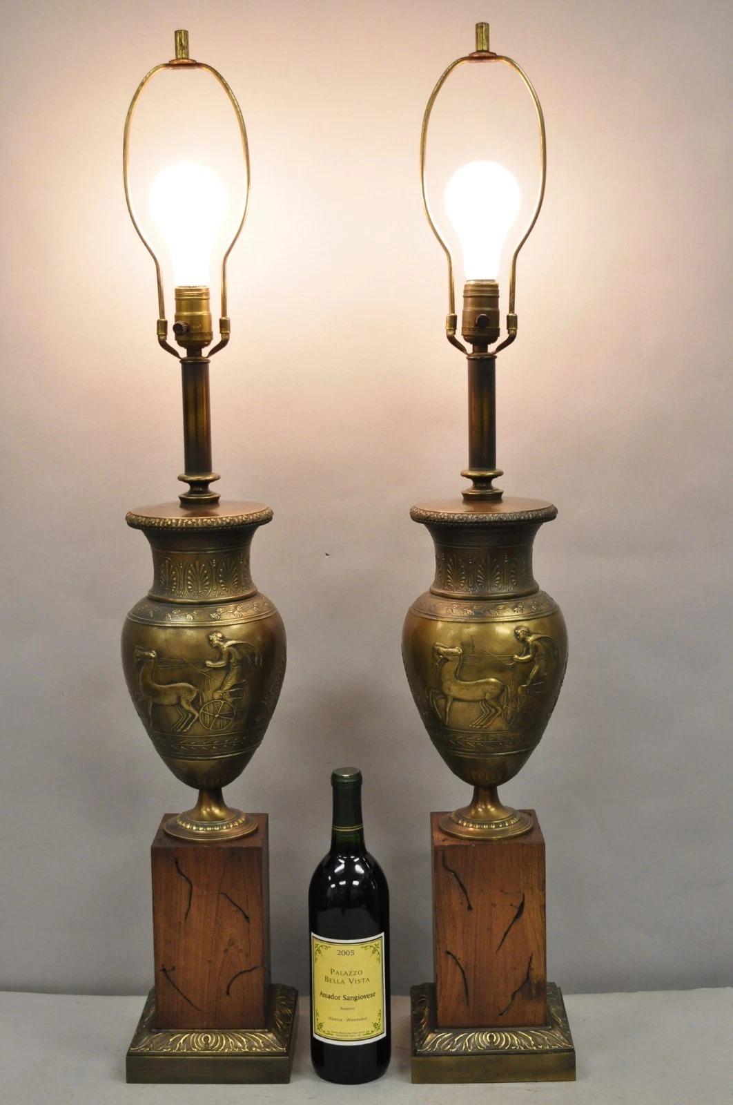 Vintage French Empire / Neoclassical Style Horse & Chariot Bronze Finish Metal Urn Table Lamps on Distressed Wood Bases by Westwood Industries - a Pair. Circa Mid 20th Century. Measurements: 38