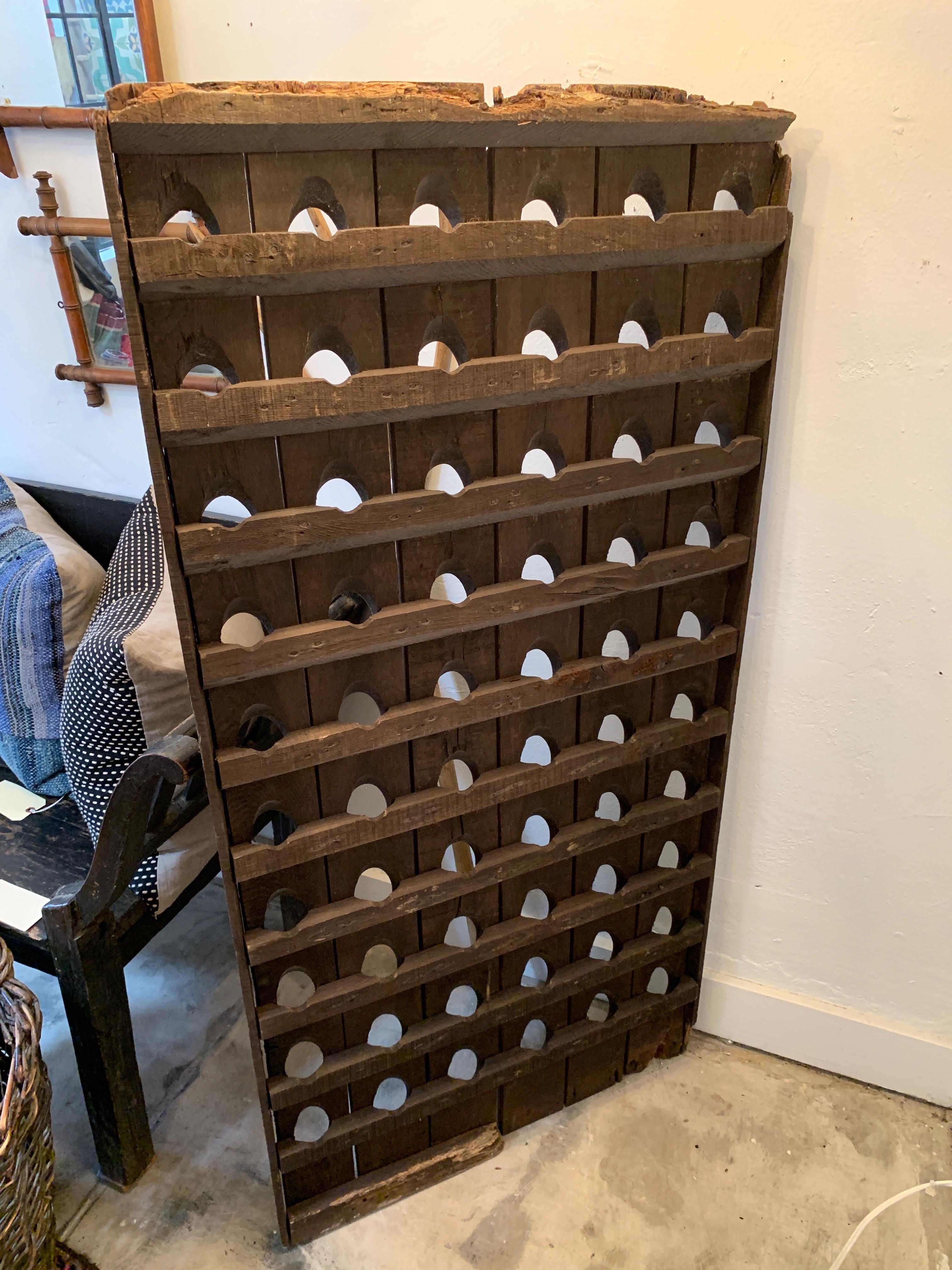 This beautiful vintage rustic wine rack balances up to 60 wine bottles, the ingenious design allows for a slim and minimal wine rack for the discerning sommelier, or those looking for a piece full of character in their home.