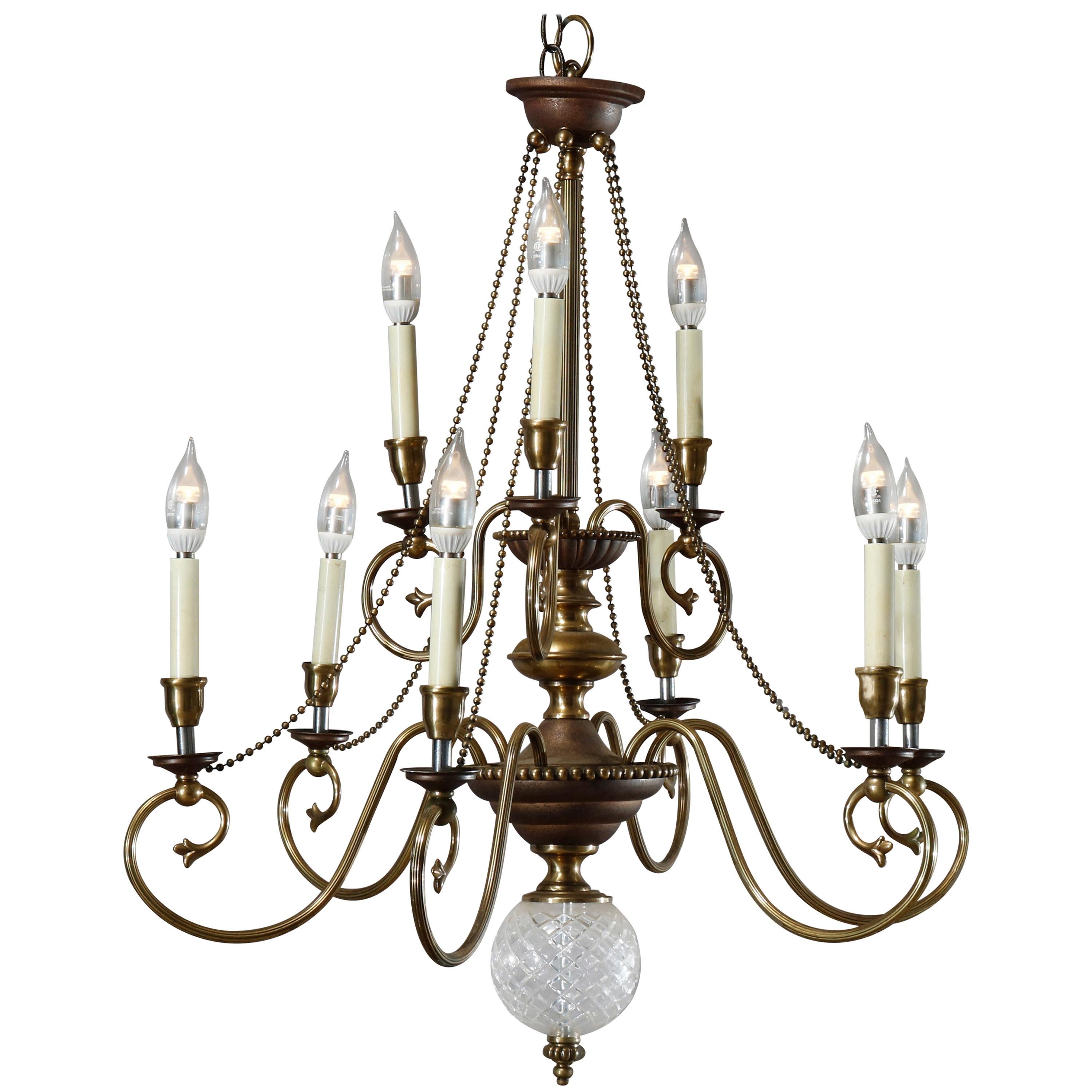Vintage French Nine-Light Tiered Brass and Crystal Chandelier, 20th Century For Sale