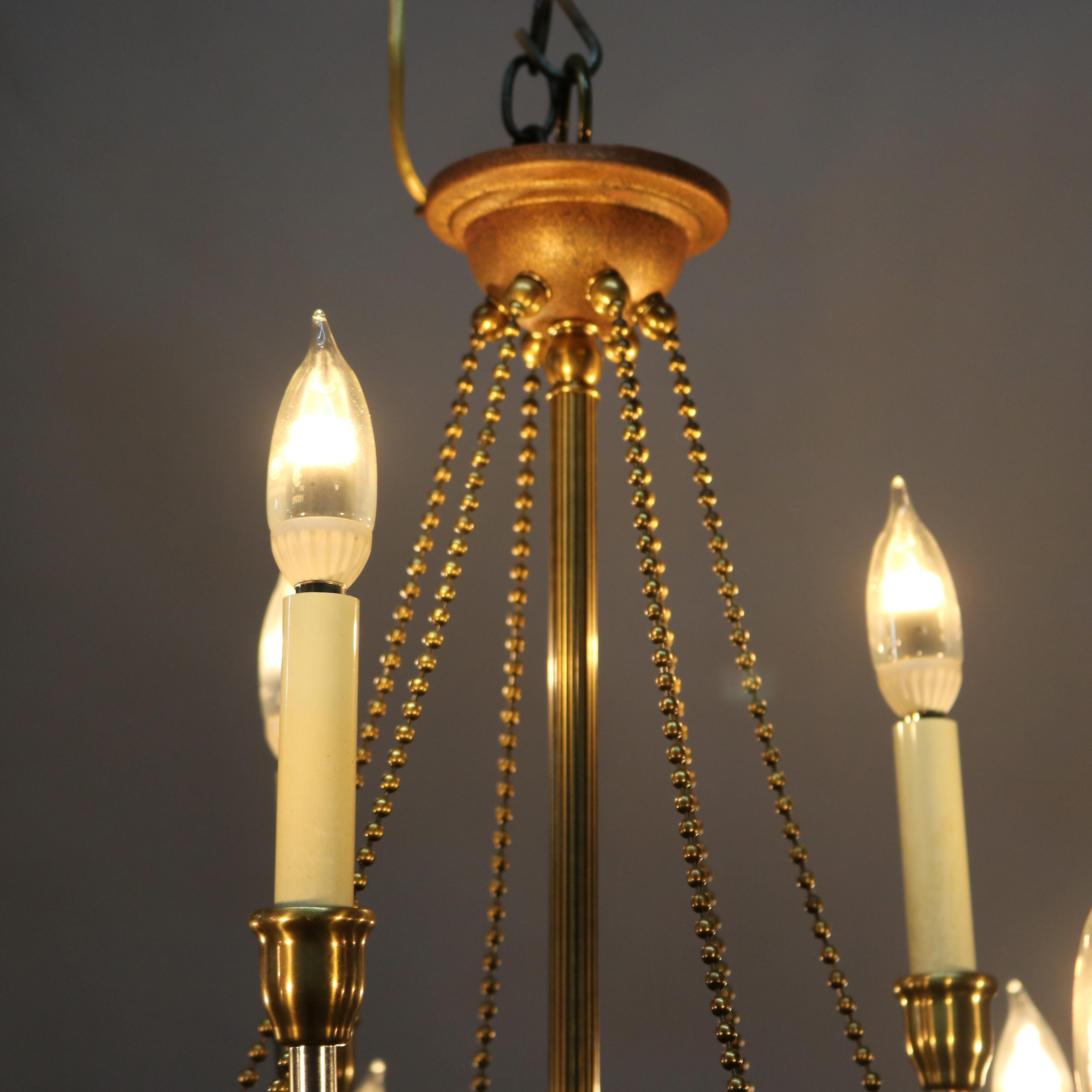 Vintage French Nine-Light Tiered Brass and Crystal Chandelier, 20th Century For Sale 3