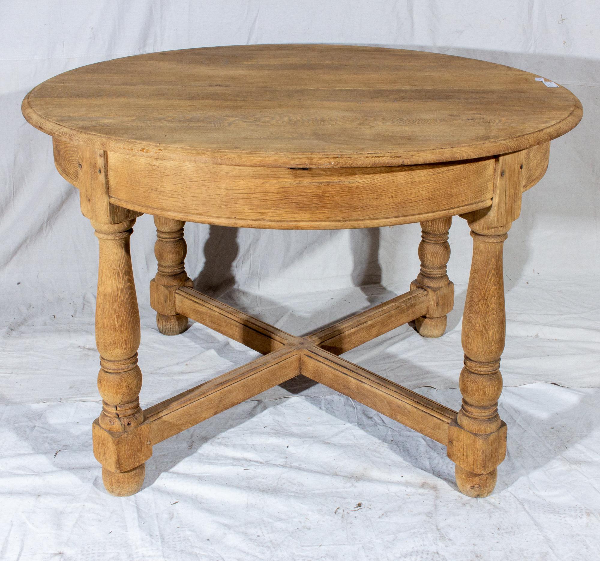 This vintage, French oak butterfly leaf table is perfect for those who need a little extra room for special gatherings. When closed, this table easily accommodates four people comfortably... and when guests arrive, simply open the middle section and