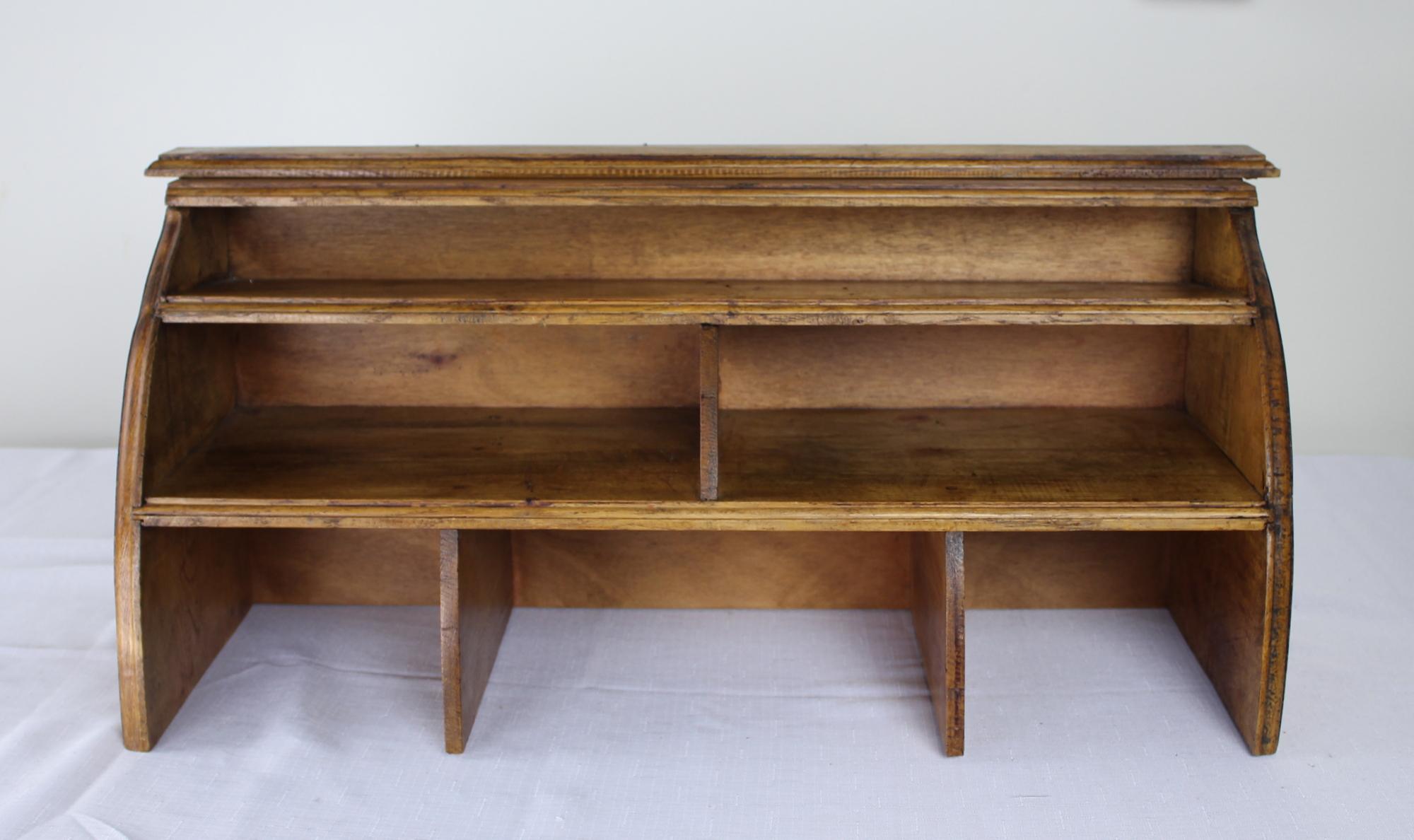 A beautifully made oak French desk organizer, circa 1960. Fine glowing wood and elegant silhouette. Would look smart atop one of our antique writing tables.