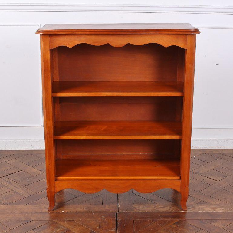 Vintage French open bookcase in cherry.  Lovely scrolling and patina. Smaller footprint makes it ideal for many locations throughout the home. Mid-20th Century.



 