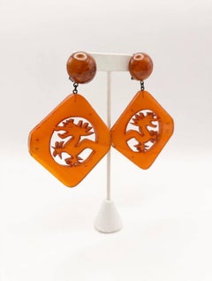 Vintage French Orange Carved Dragon Bakelite Earrings