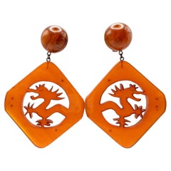 Vintage French Orange Carved Dragon Bakelite Earrings