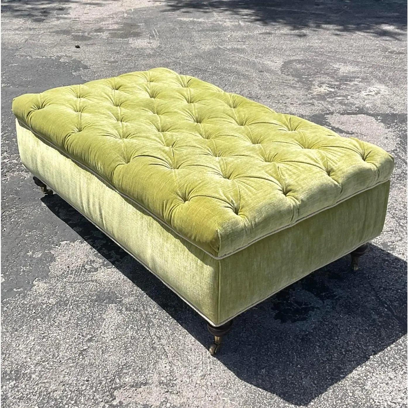 A fabulous vintage Tufted ottoman. A classic turned wooden leg design with a bright apple green velvet. Perfect as is or reupholster to coordinate with your project. You decide! Acquired from a Palm Beach estate.