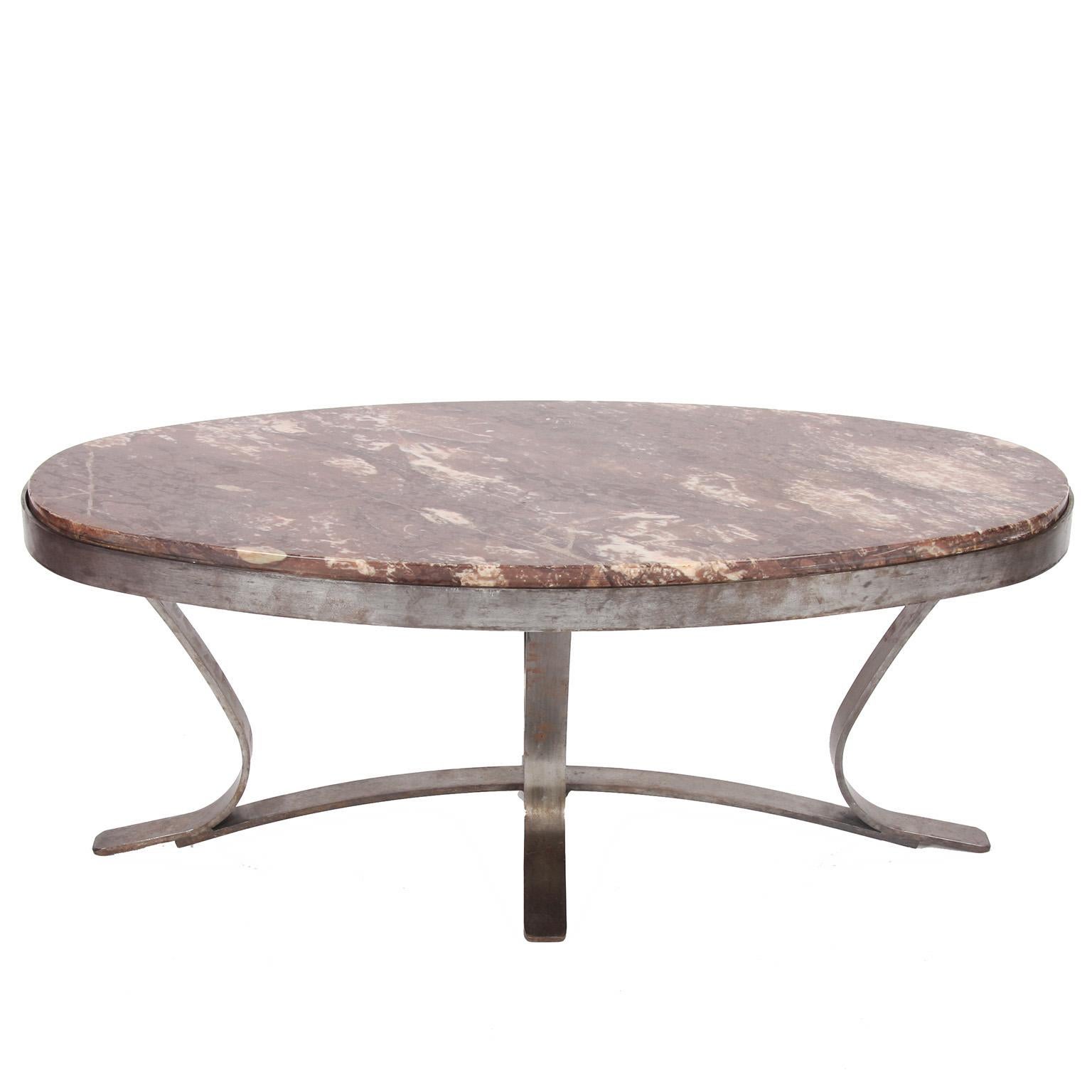 French, 1970s

An oval, marble and brushed steel, low coffee table.