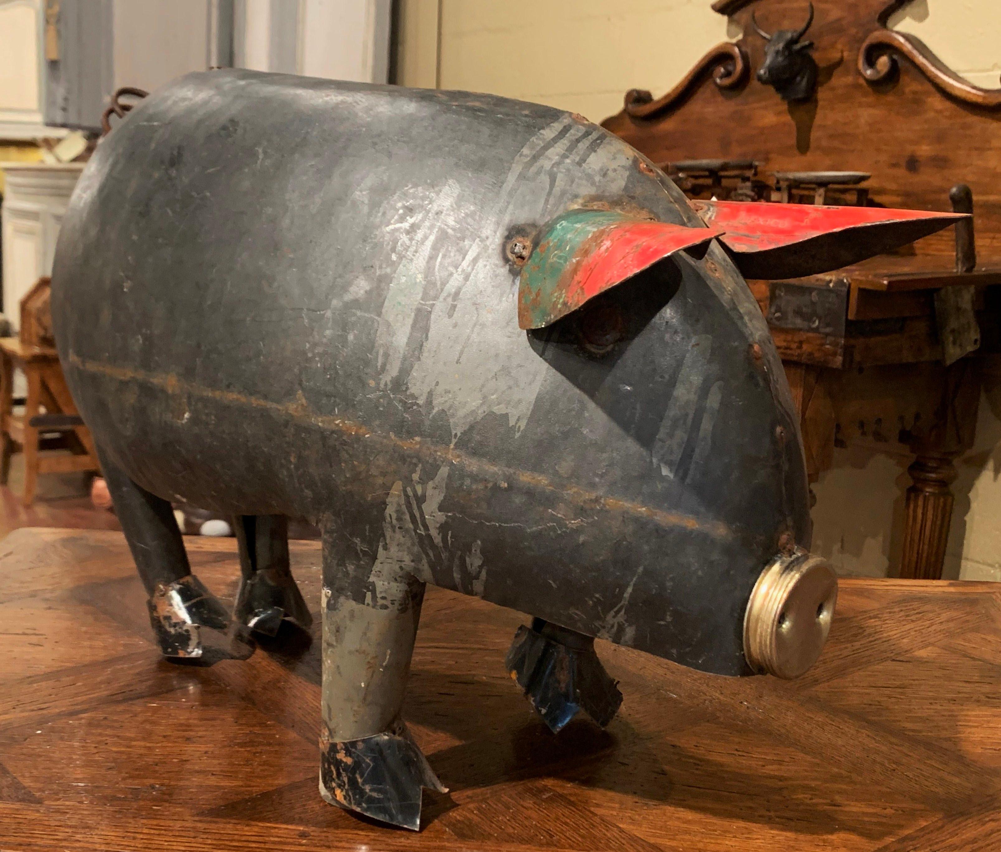 Add French countryside charm to your home with this interesting pig sculpture from Southern France. The farm animal is crafted from old metal elements, and is finished with its original paint. This piece would make a fun, colorful addition for any