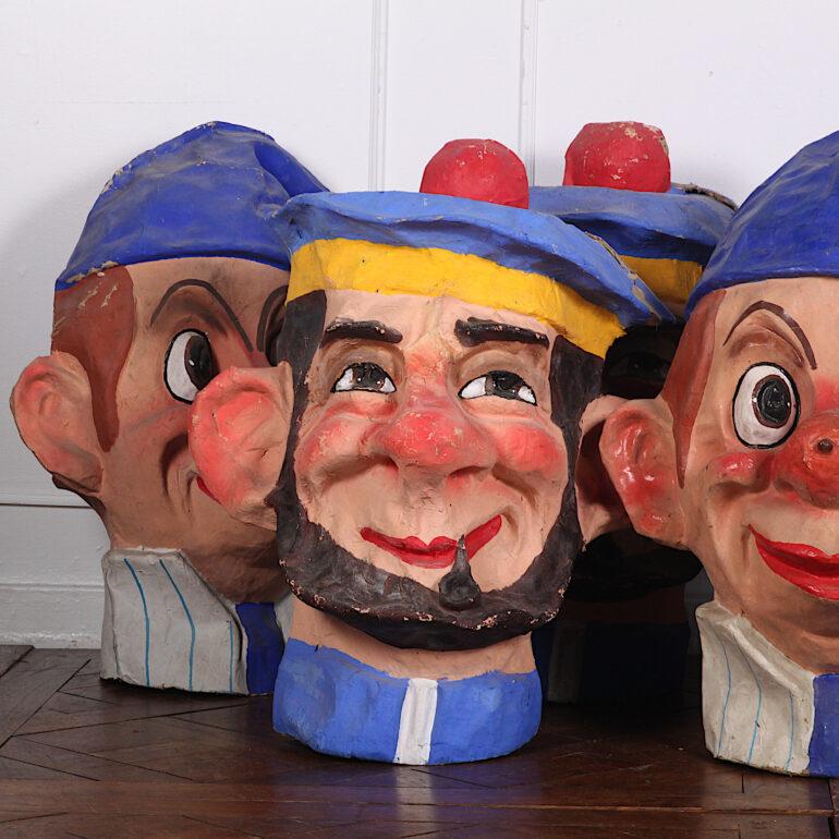 A variety of large brightly-painted vintage French papier mâché Carnival or ‘caricature’ type heads.



 