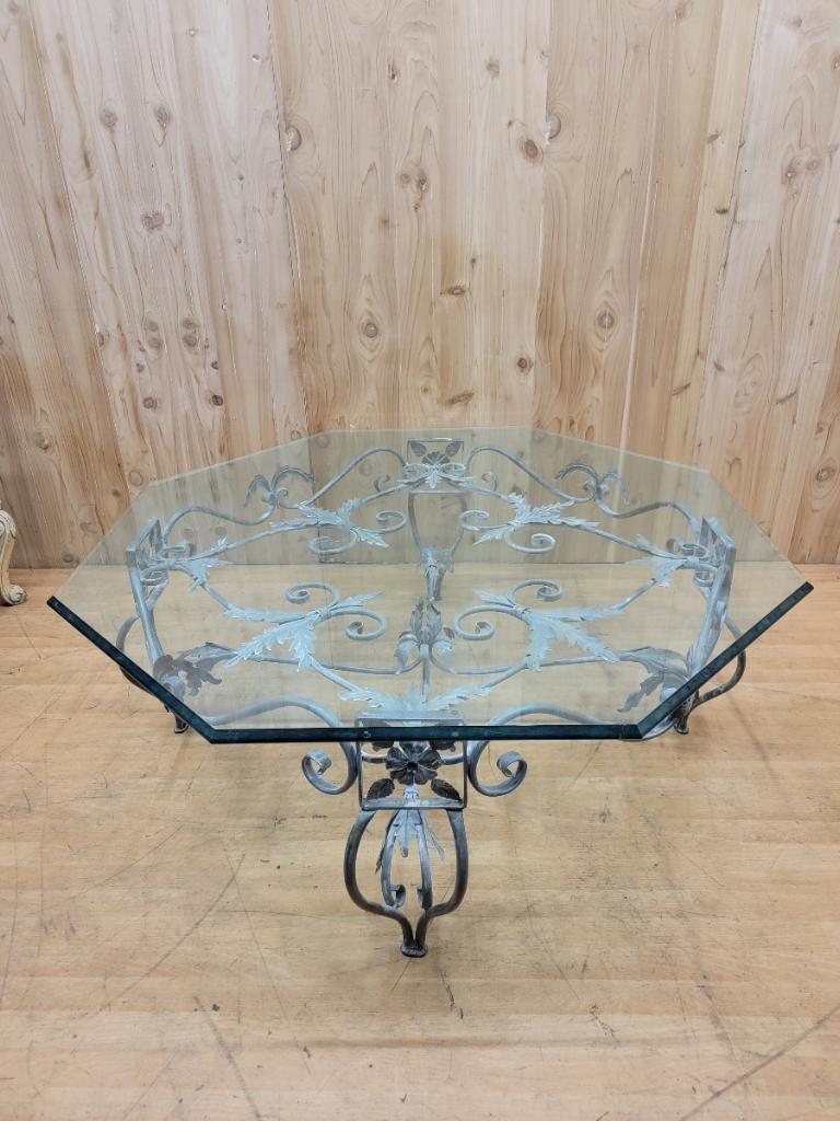 Vintage French Parisian Wrought Iron Octagonal Glass Top Coffee Table

This gorgeous thick cut and beveled octagonal glass top table from France is supported by a huge patinated Verdigris iron base. The base is beautifully designed with an eight