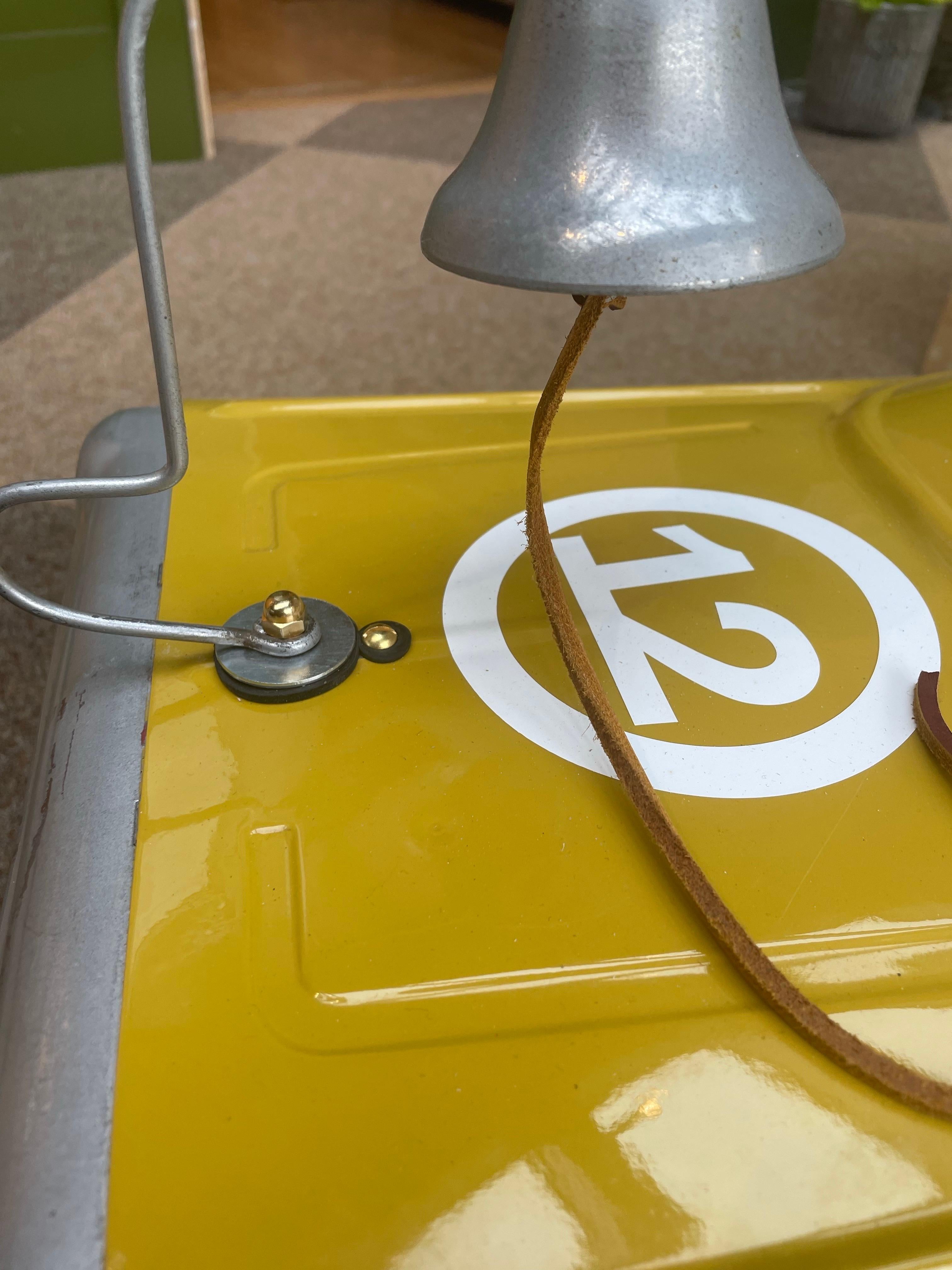 A beautifully restored midcentury French pedal car, dating from the 1950s. Featuring a streamlined silhouette reminiscent of early Grand Prix racers, this vintage toy vehicle captures the spirit of postwar European design. The metal body has been