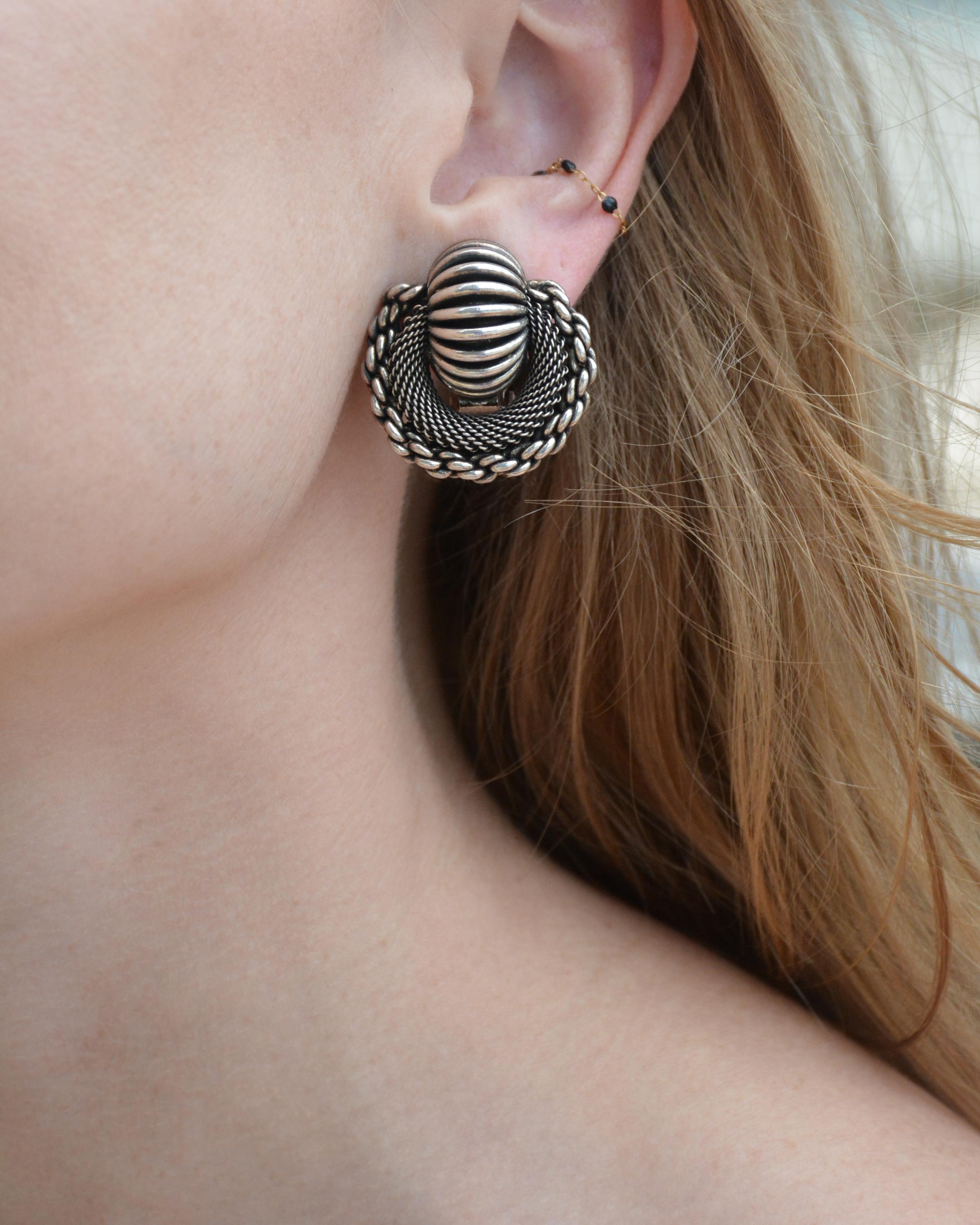 These vintage 1980s Pierre Lorion & Sylvia Karels sculptural silver earrings have an incredibly cool design, full of geometric forms and varying textures. Made in France by Parisian jewelry designers Pierre Lorion & Sylvia Karels, they immediately