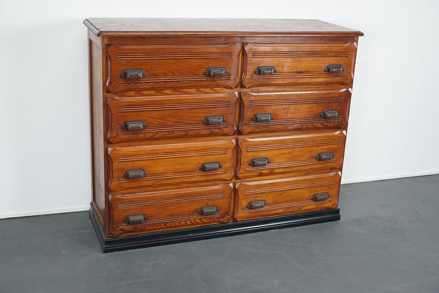 This vintage drawer cabinet originates from France. It is made from pine and features 8 large drawers. It is restored and the drawers open and shut smoothly. The inside of the drawers measure 35 x 53 x 16cm.