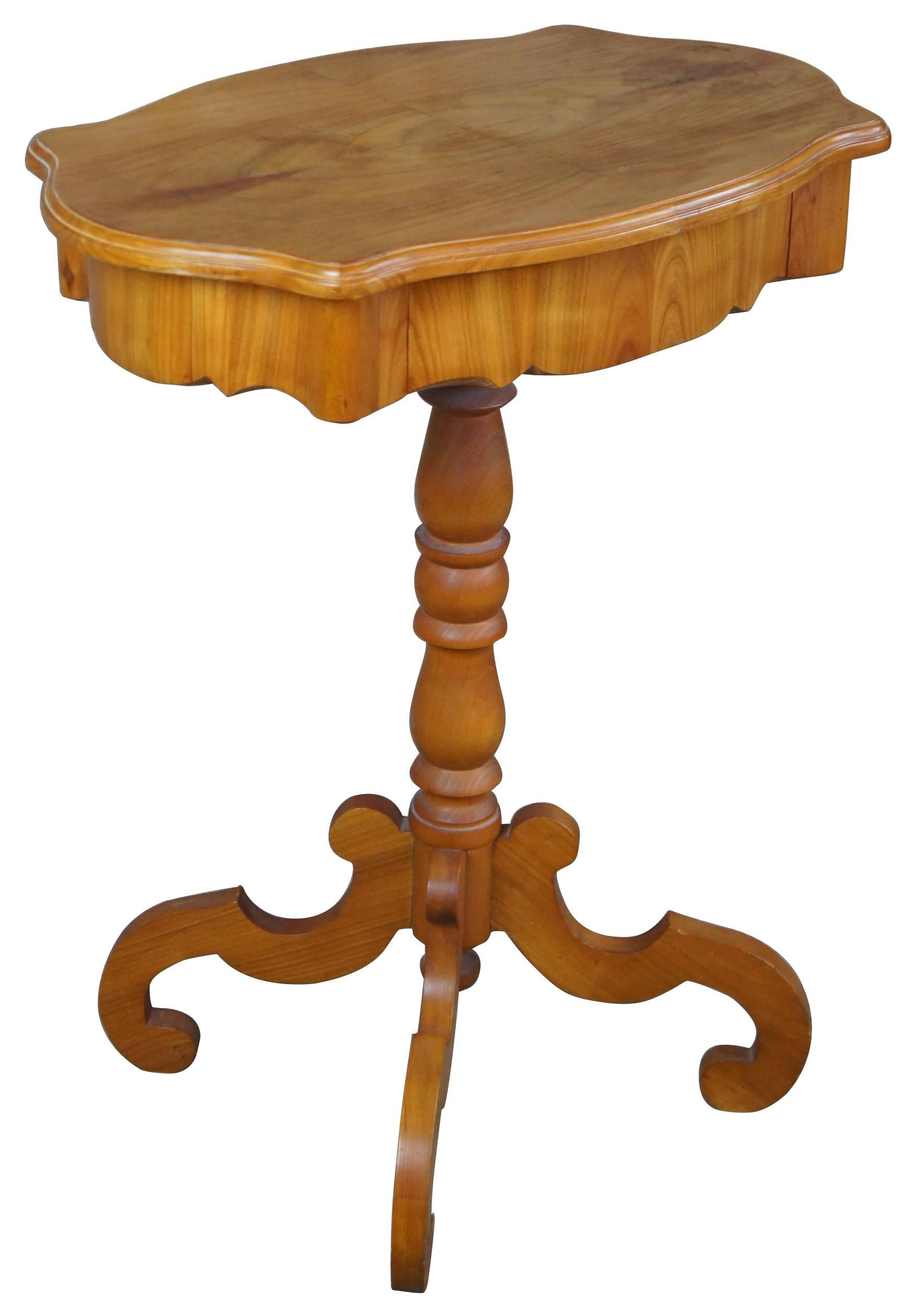 20th century French turtle top side table with drawer. Features a turned center support, scrolled legs and scalloped shape.