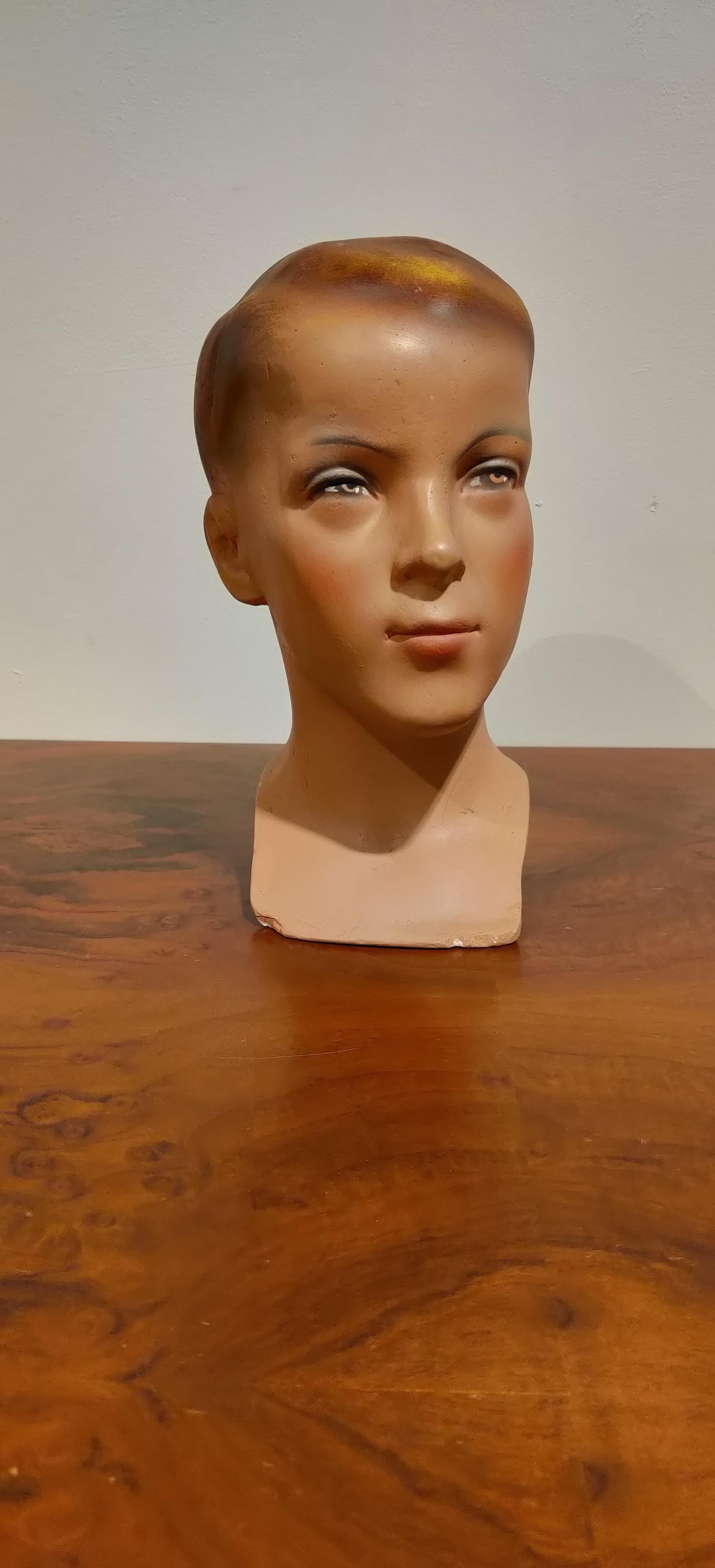 Beautiful child mannequin head made from plaster. 

It has some minor user traces.

Comes from a lot acquired from a clothes shop that stopped activities.

Great decorative item to display glasses, hats,..

France - 1960s

Measure: Height