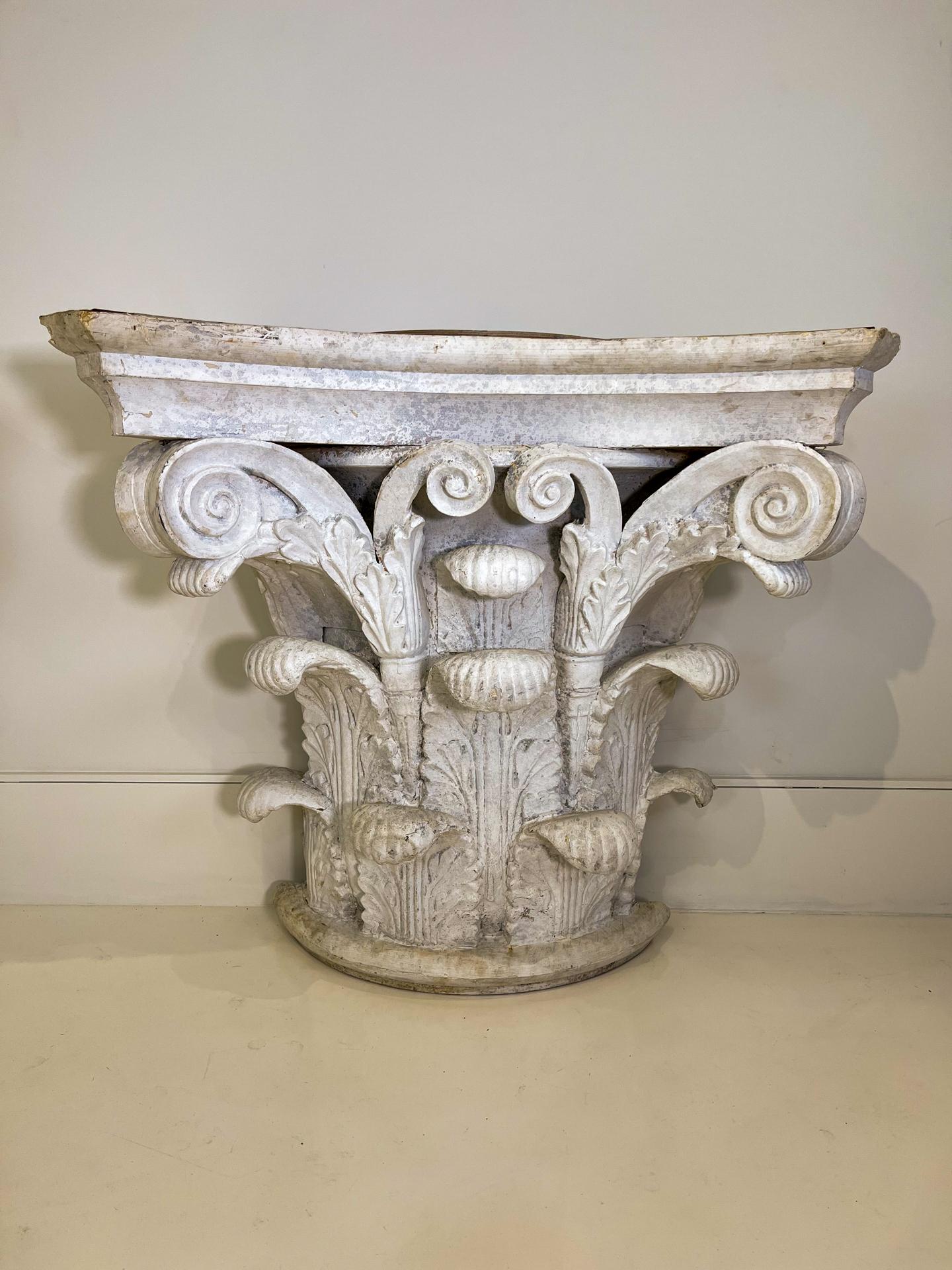 Dramatic Corinthian capital purchased in France - ideal for a console. Made of a metal frame with fiberglass form covered in plaster, all that is needed is a marble top. Would be fabulous flanking a fireplace or could be used as a bar if shelves are