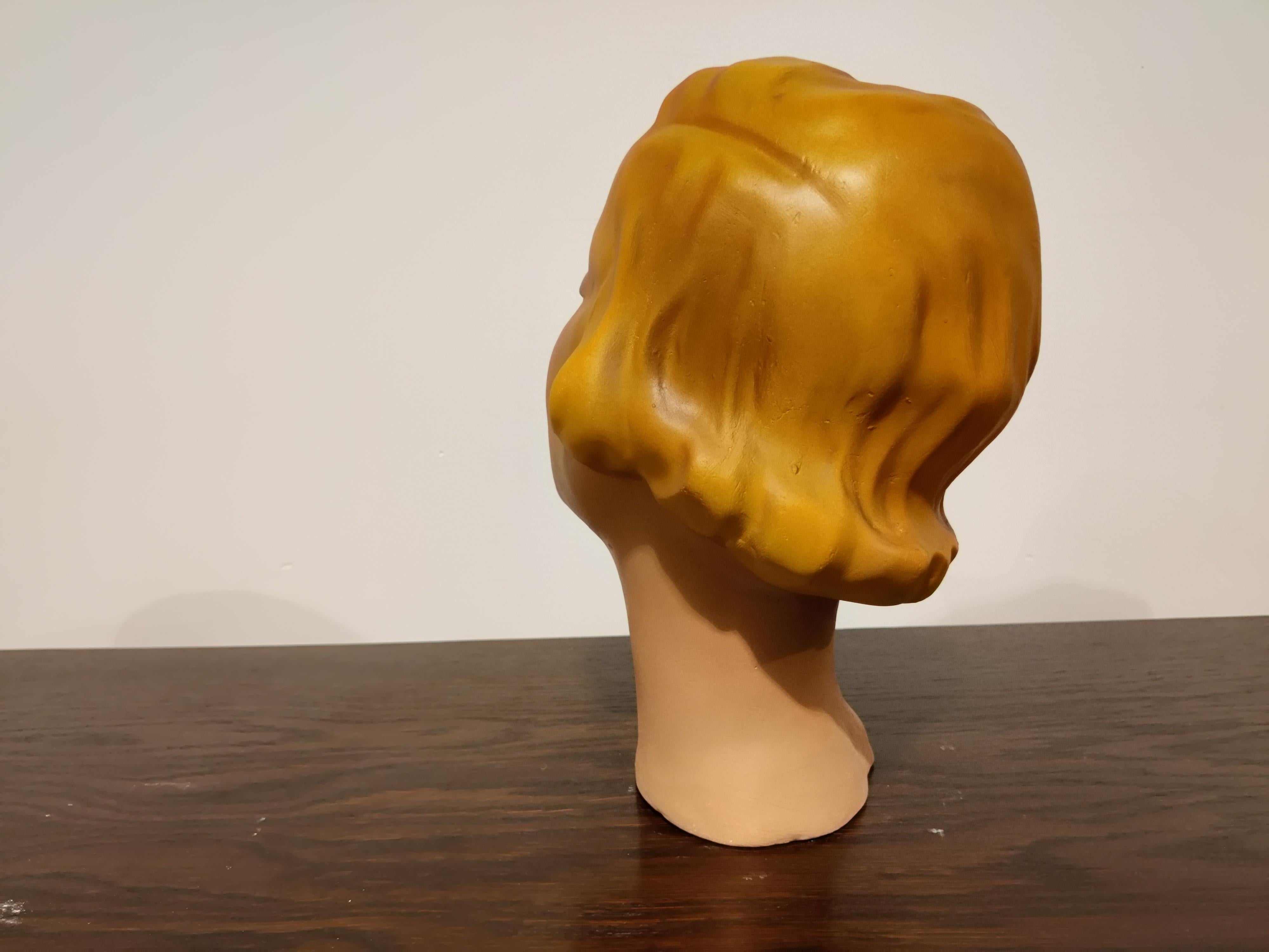 Beautiful female mannequin head made from plaster.

It has some minor user traces.

Comes from a lot acquired from a clothes shop that stopped activities.

Great decorative item to display glasses, hats,

France, 1960s

Measures: Height