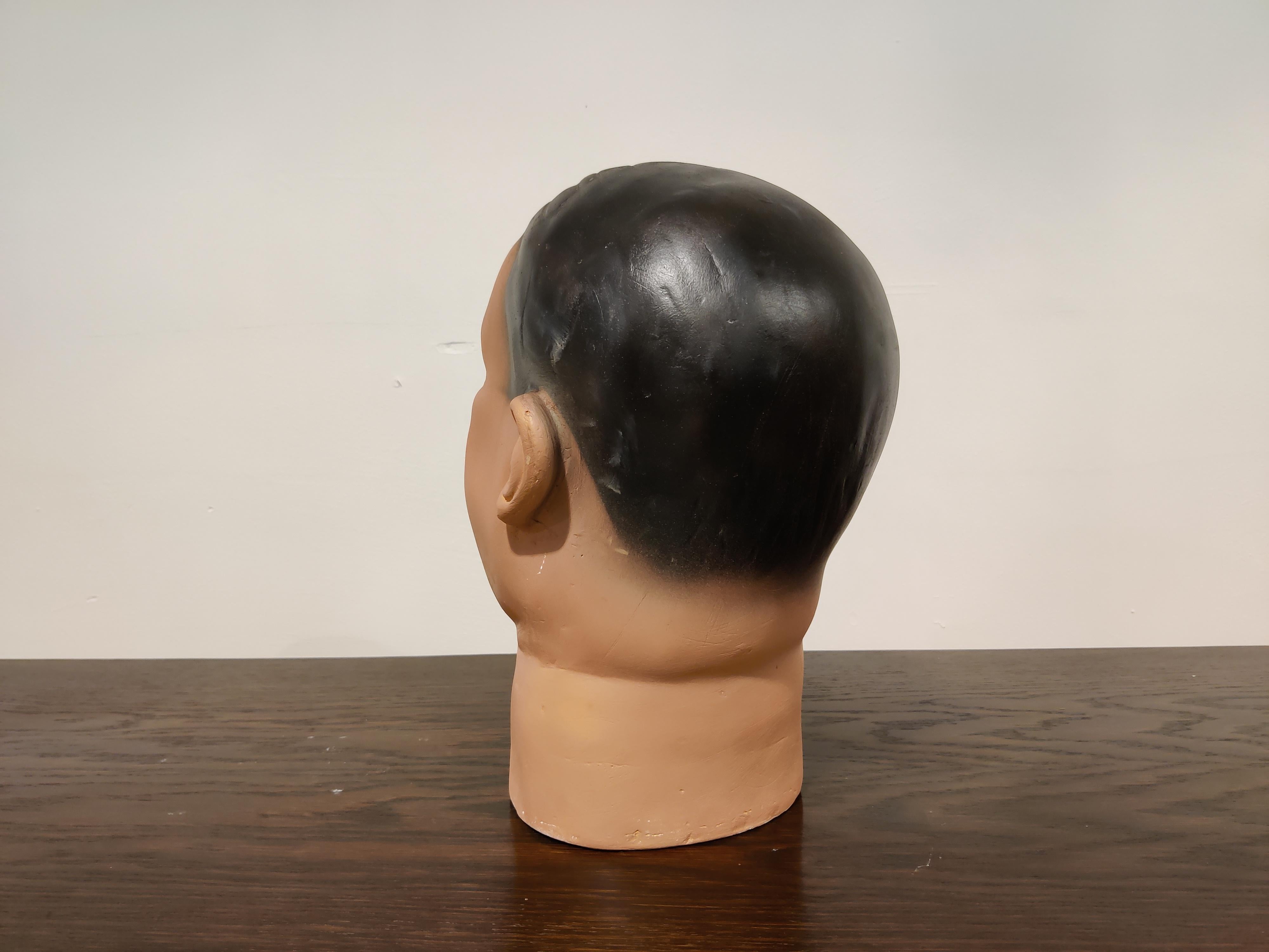 Funny male mannequin head made from plaster.

It has some minor user traces.

Comes from a lot acquired from a clothes shop that stopped activities.

Great decorative item to display glasses, hats,

France, 1960s

Measures: Height