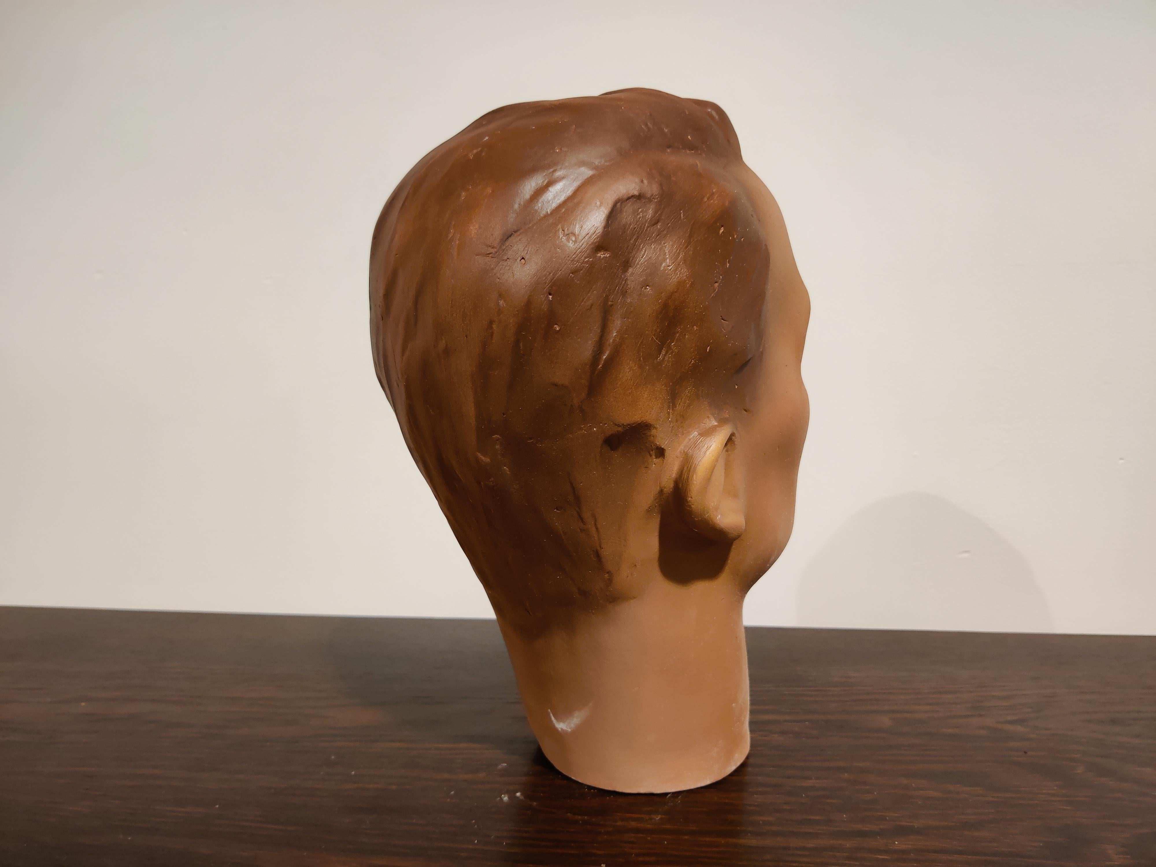 Beautiful male mannequin head made from plaster. 

It has some minor user traces.

Comes from a lot acquired from a clothes shop that stopped activities.

Great decorative item to display glasses, hats.

France, 1960s

Size: Height
