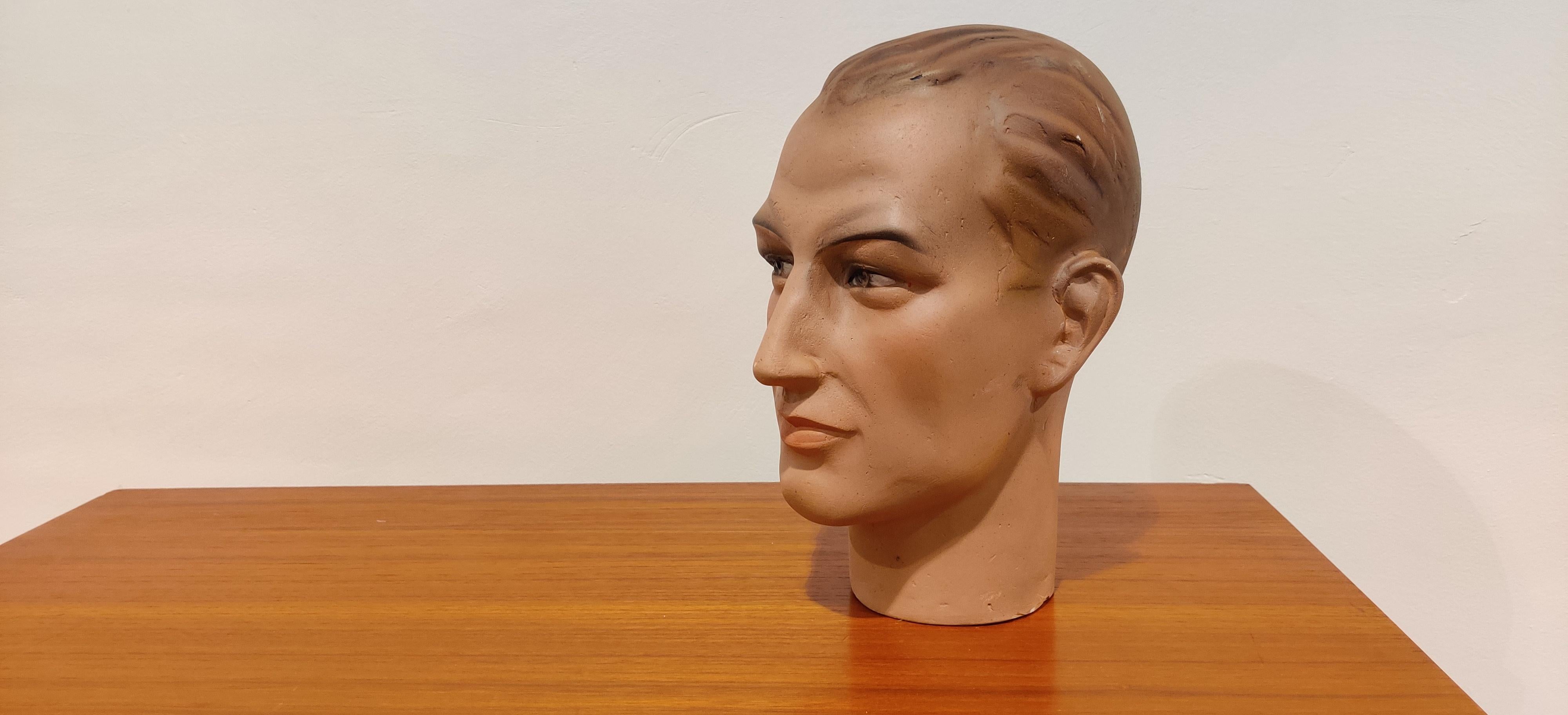 Beautiful funny male mannequin head made from plaster.

It has some minor user traces.

Comes from a lot acquired from a clothes shop that stopped activities.

Great decorative item to display glasses, hats,

France, 1960s

Measures: