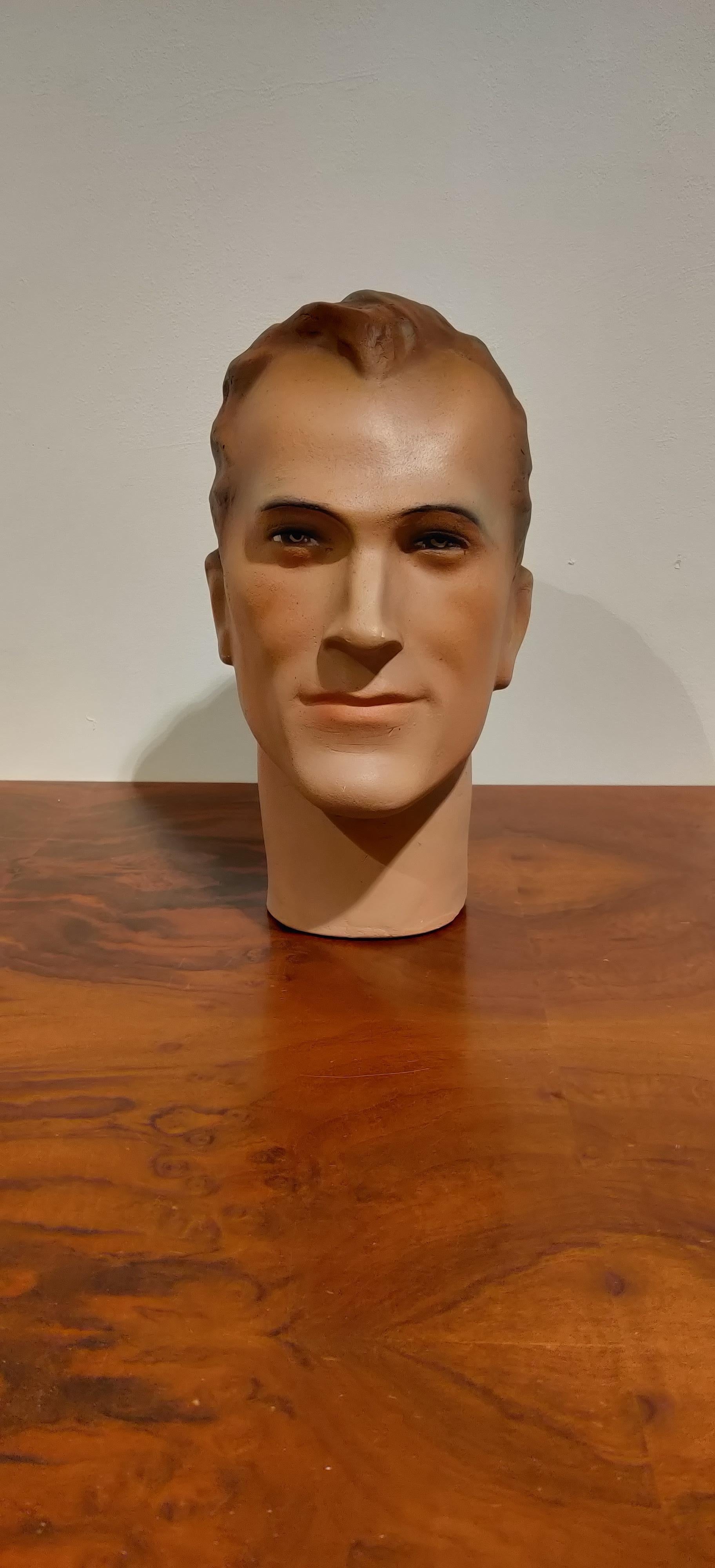 Beautiful male mannequin head made from plaster. 

It has some minor user traces.

Comes from a lot acquired from a clothes shop that stopped activities.

Great decorative item to display glasses, hats,

France, 1960s

Measures: Height