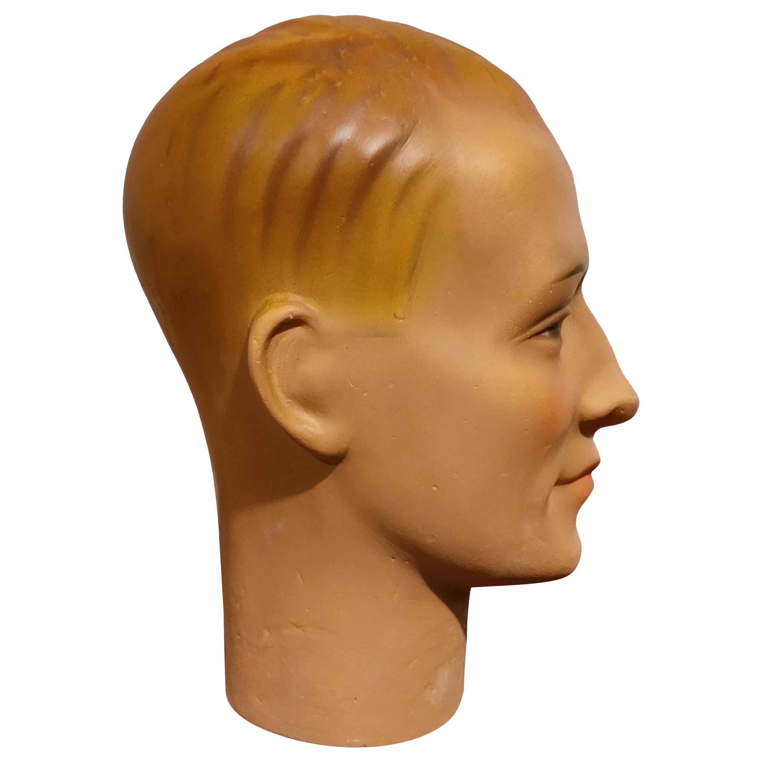 Beautiful male mannequin head made from plaster.

It has some minor user traces.

Comes from a lot acquired from a clothes shop that stopped activities.

Great decorative item to display glasses, hats,

France, 1960s

Measures: Height