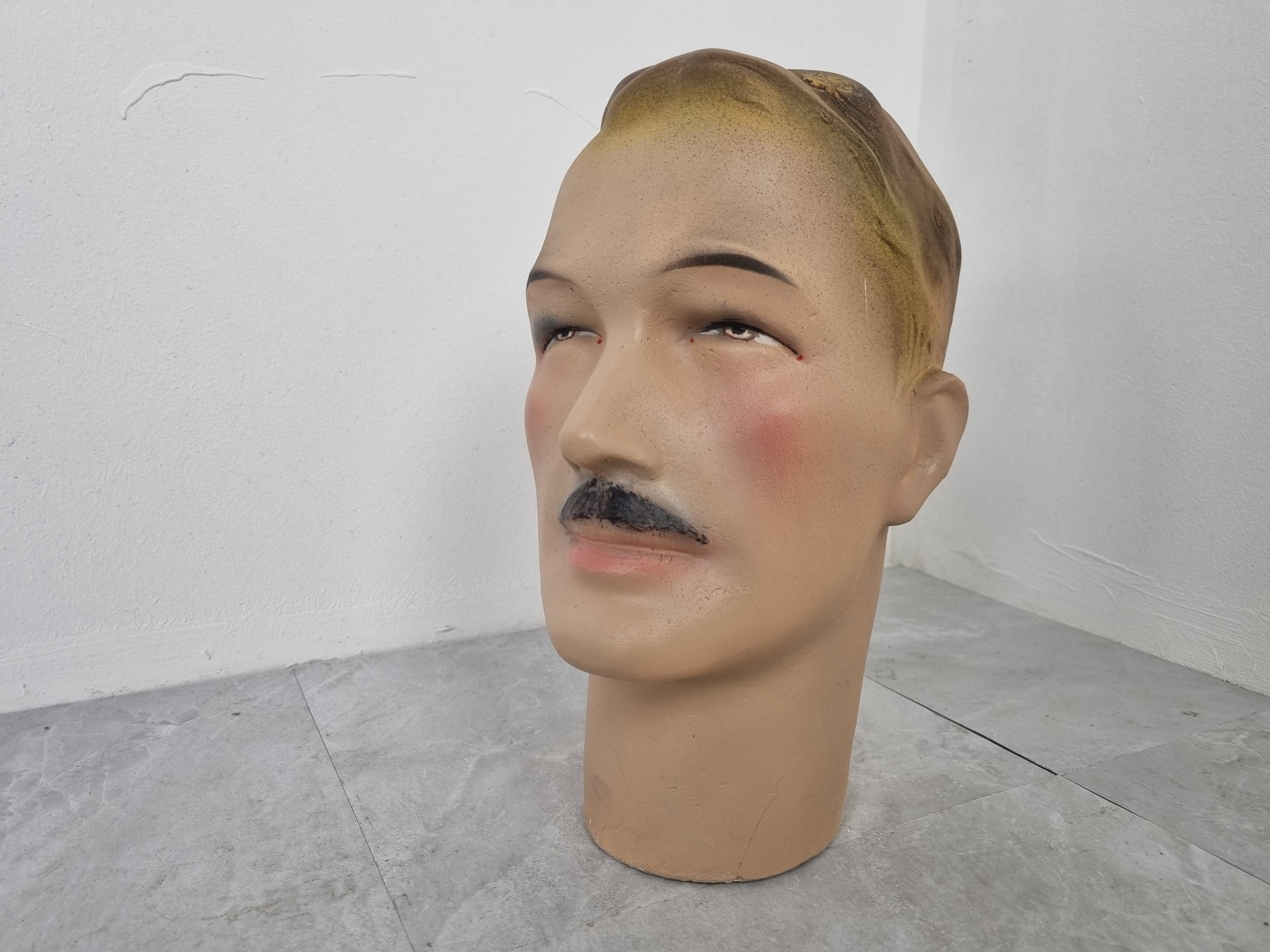 Beautiful child mannequin head made from plaster.

It has some minor user traces.

Comes from a lot acquired from a clothes shop that stopped activities.

Great decorative item to display glasses, hats,

France, 1960s

Measures: Height