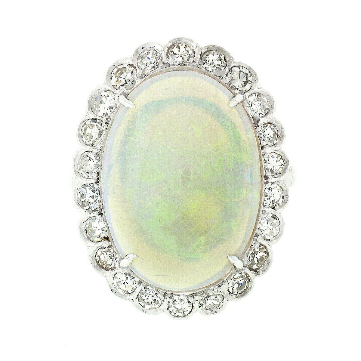 Oval Cut Vintage French Platinum GIA Oval Opal & Diamond Halo Low Profile Cocktail Ring